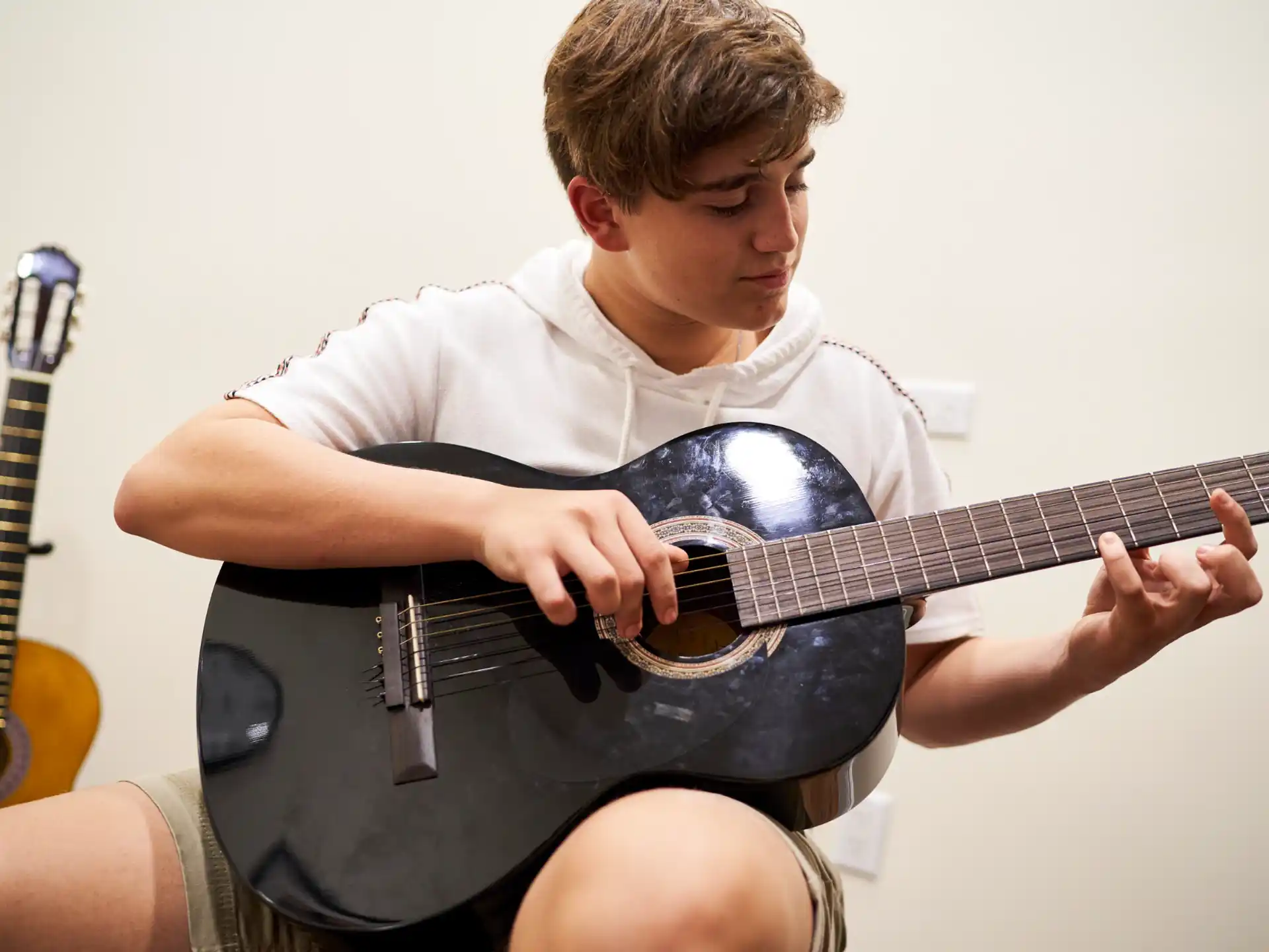 a person playing a guitar