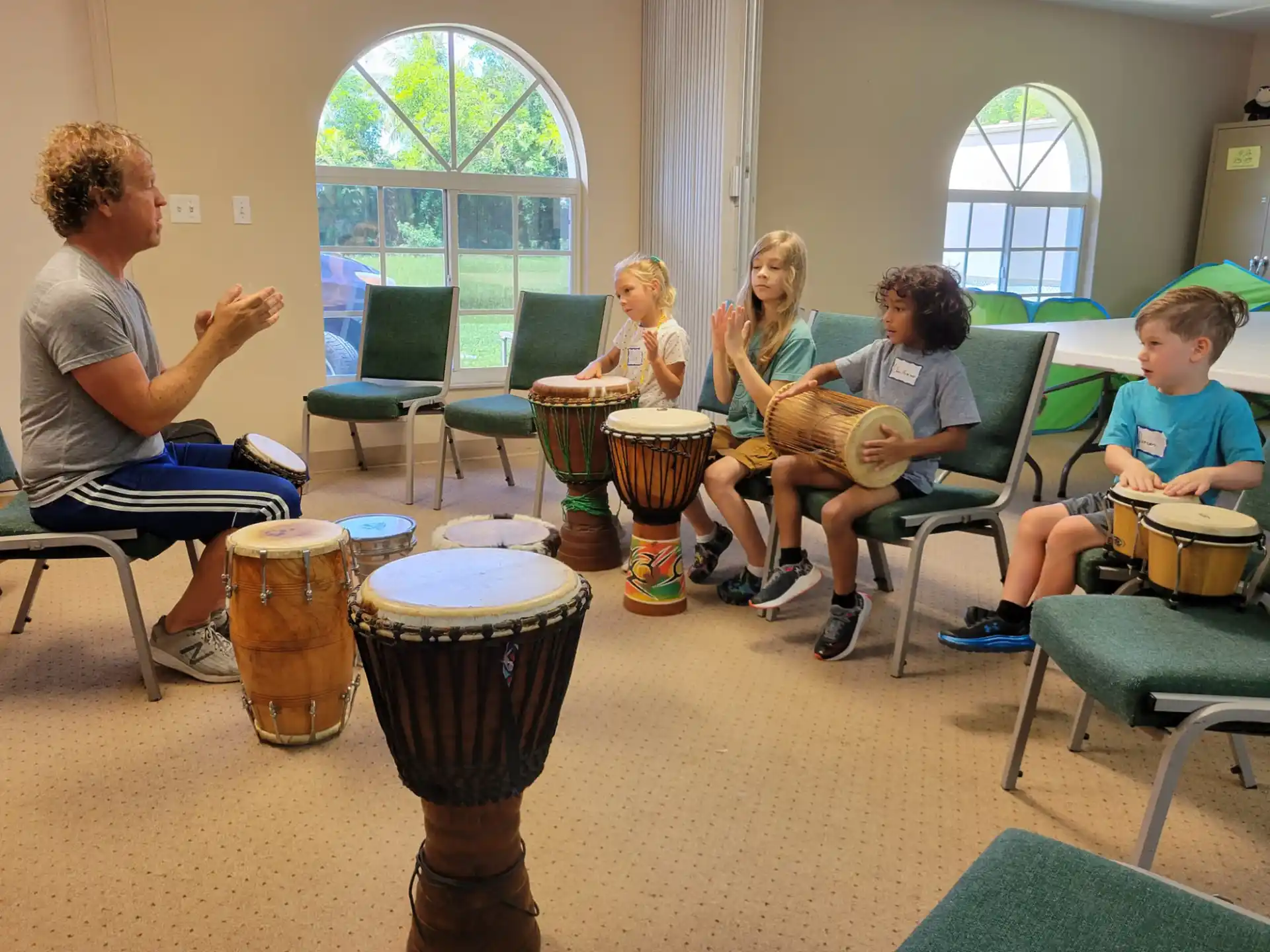 a group of people playing drums