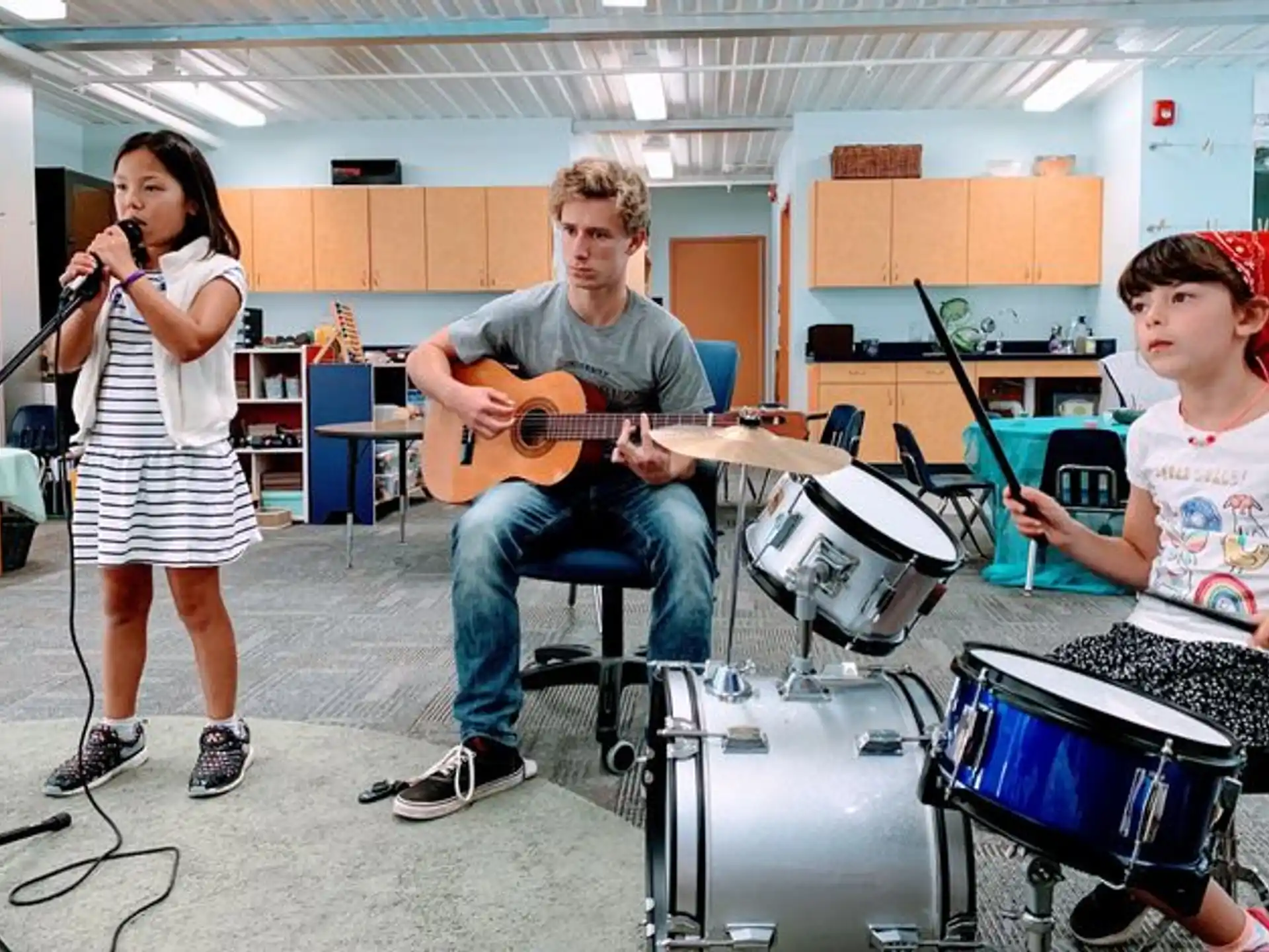 a man and a woman playing instruments