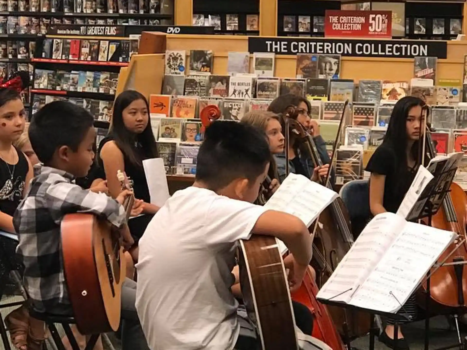 a group of people in a library