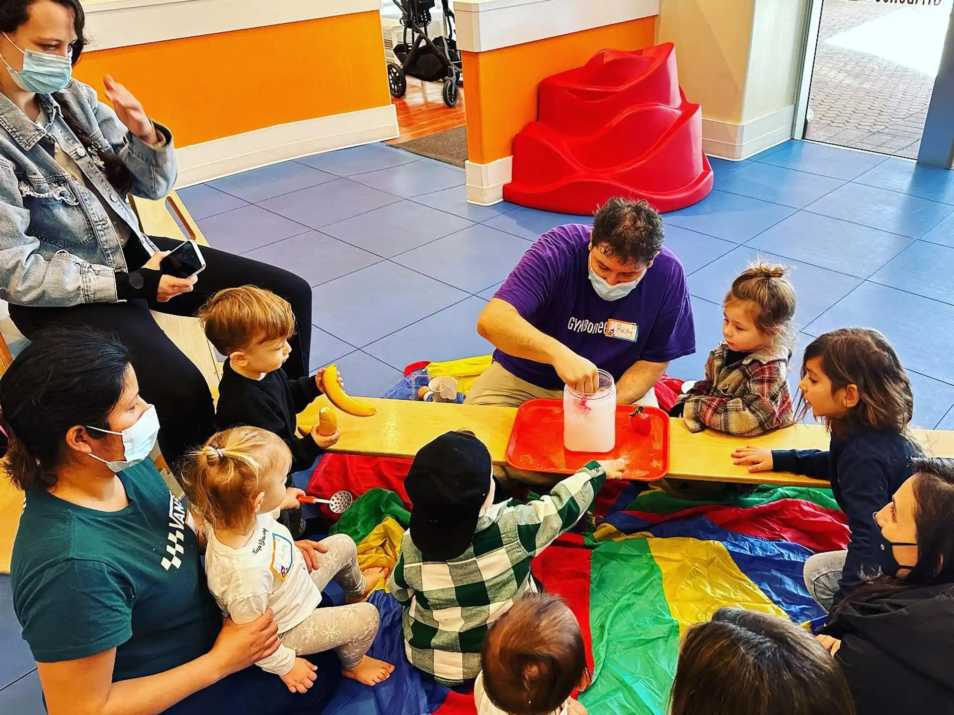 a group of people sitting on the floor