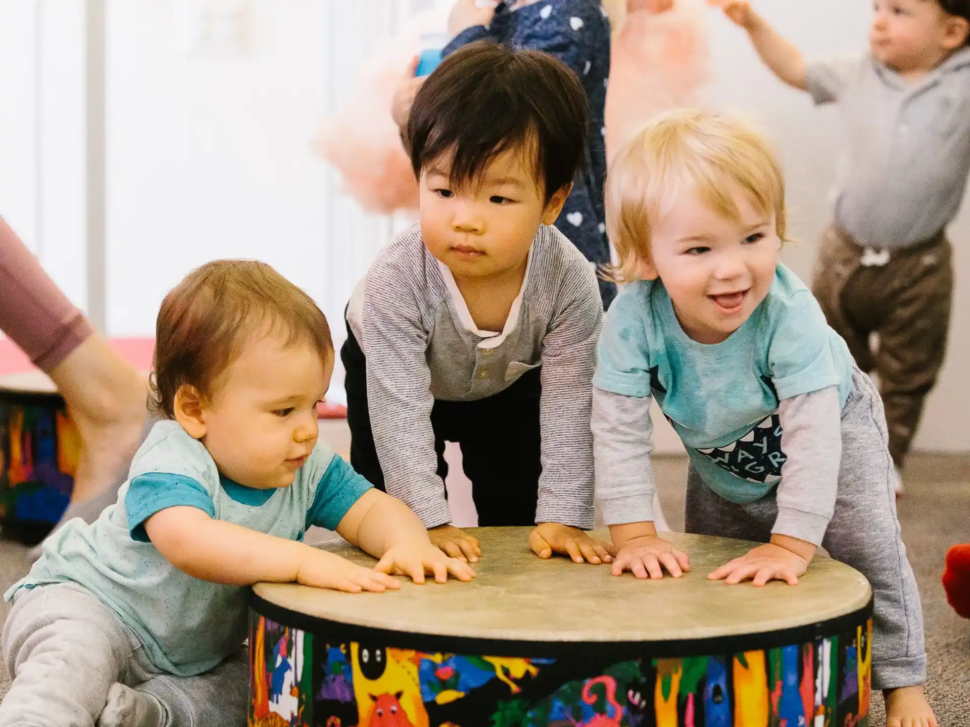 a group of children playing with a puzzle