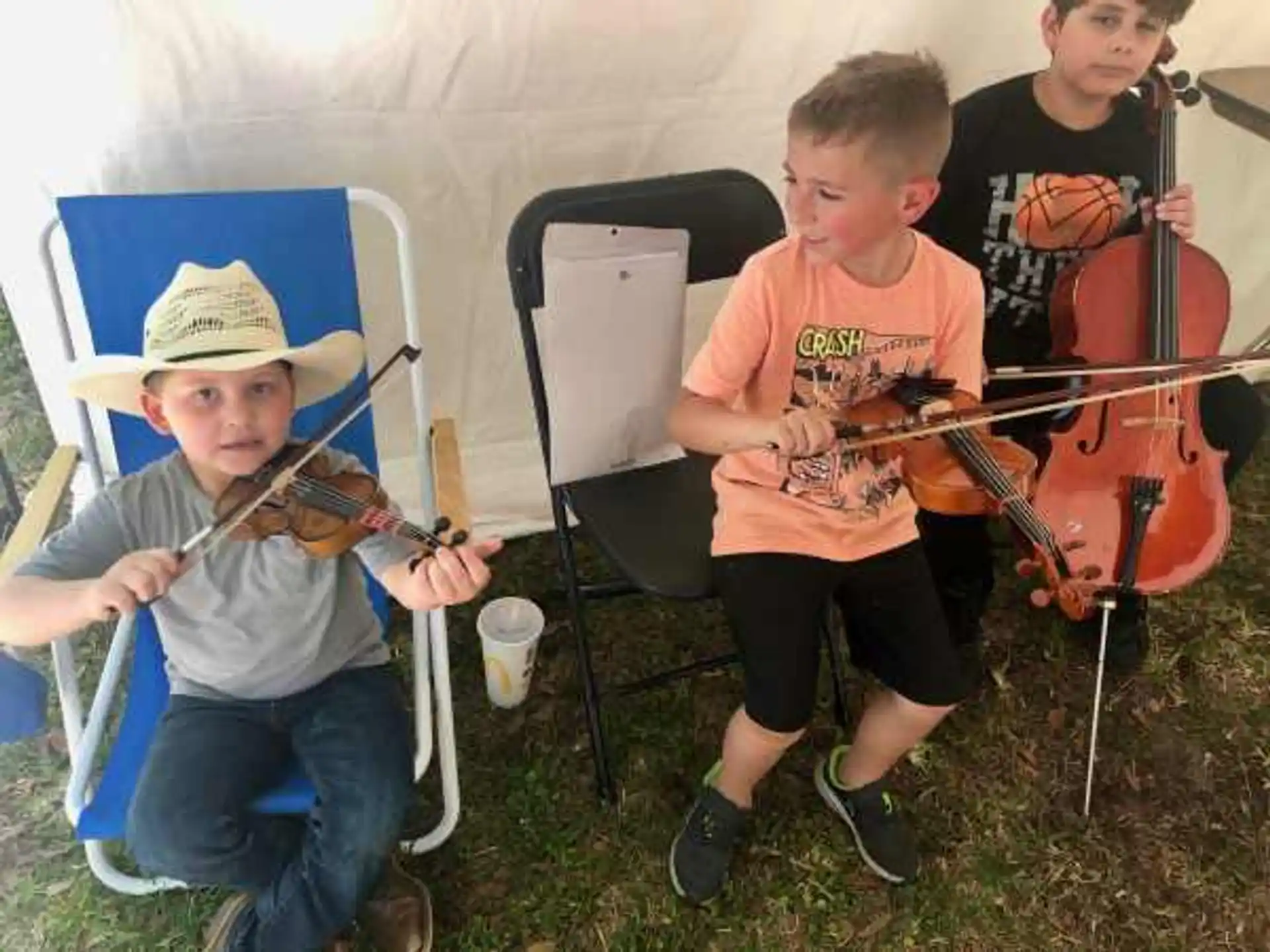 a group of boys playing instruments