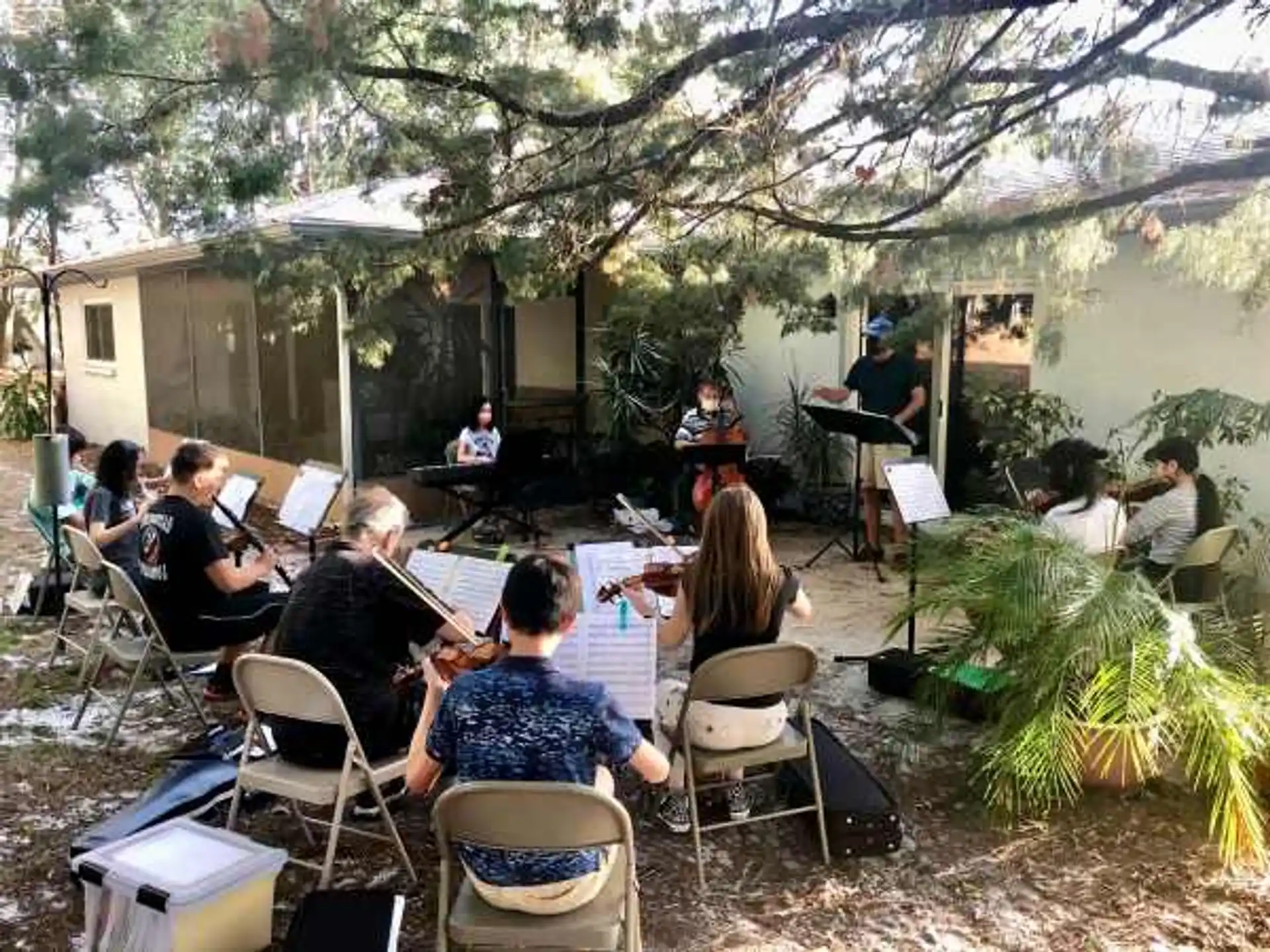 a group of people playing instruments