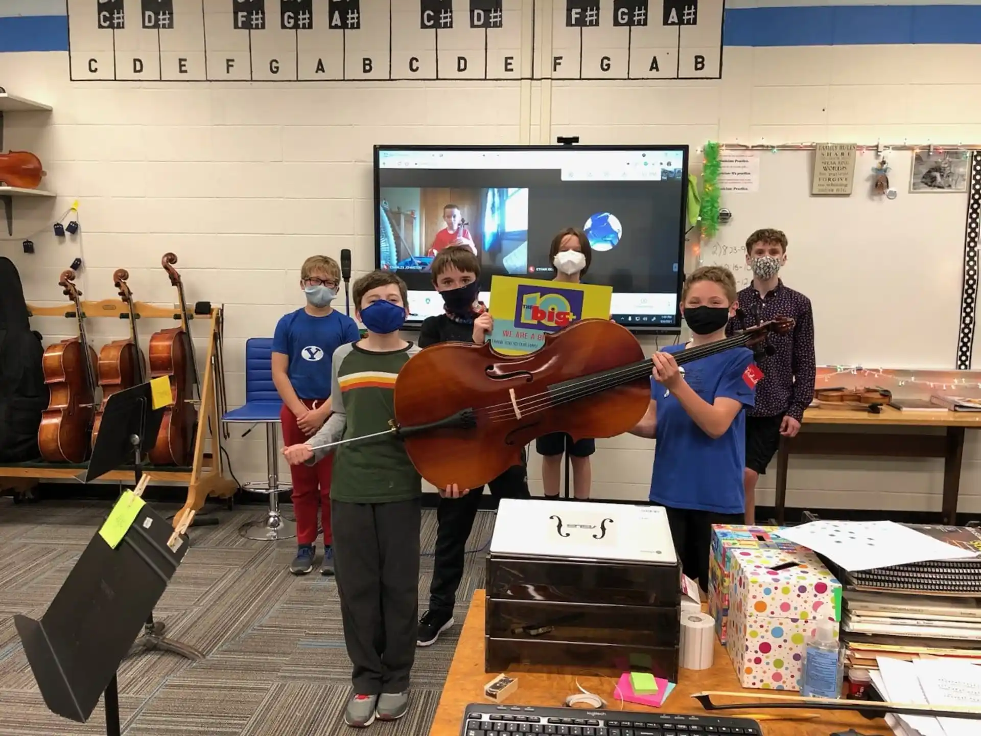 a group of people holding musical instruments