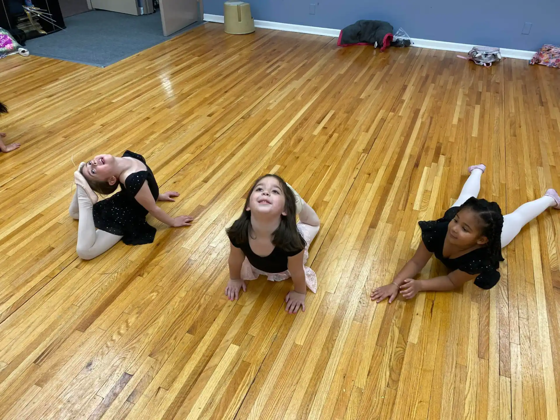 a group of women lying on the floor