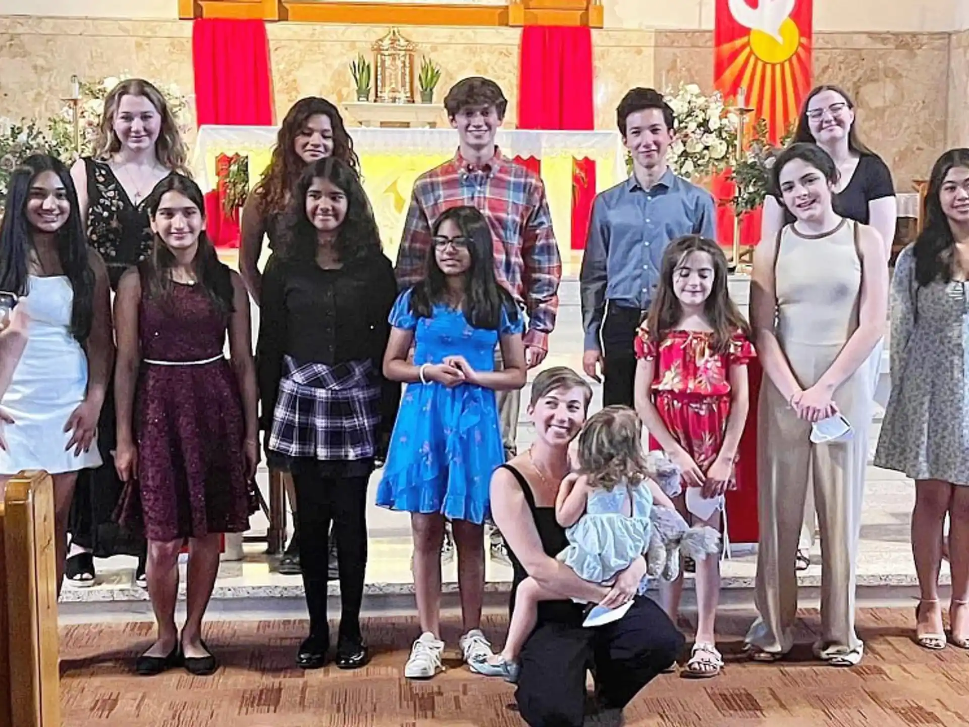 a group of people posing for a photo