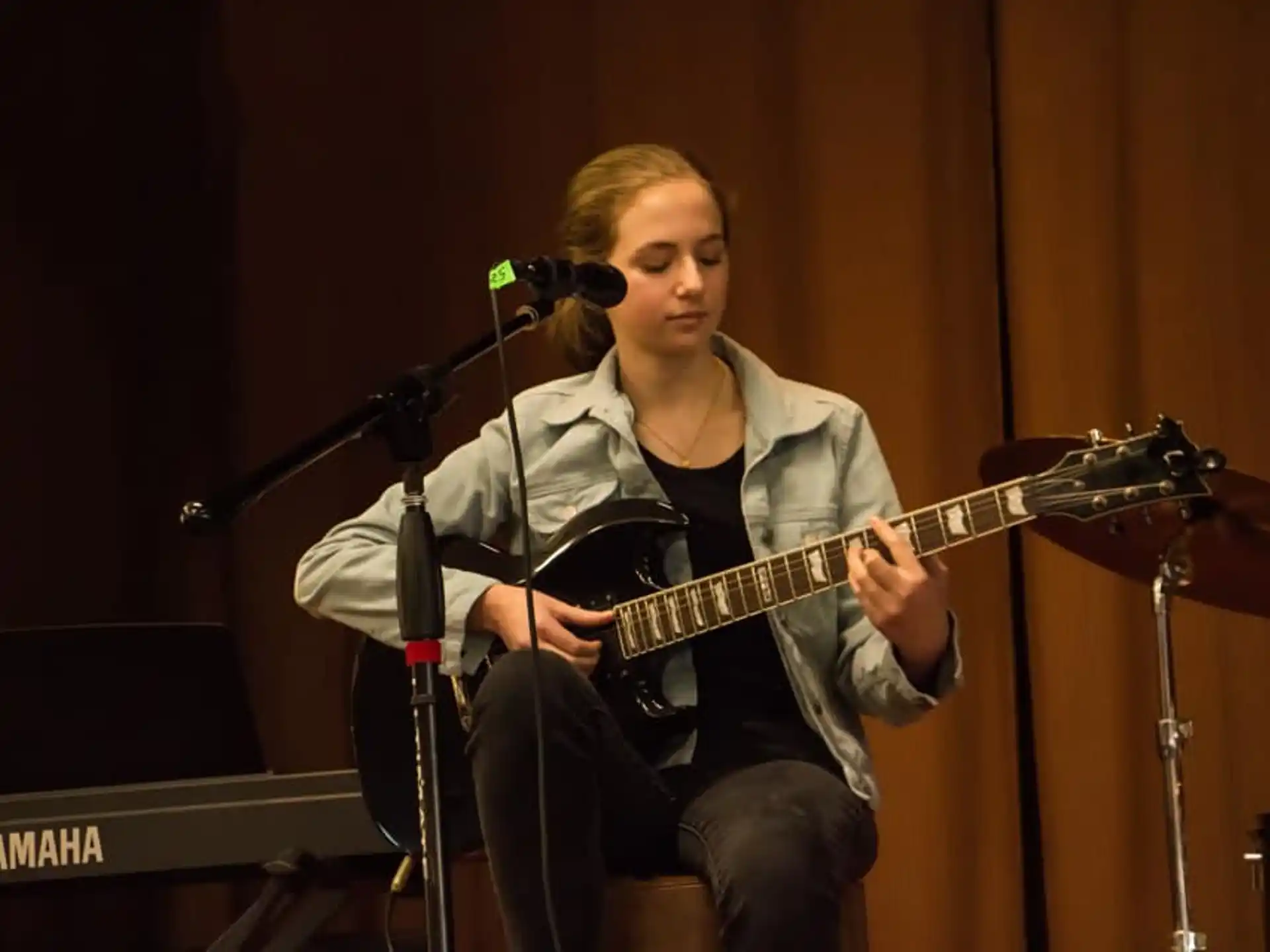 a man playing a guitar
