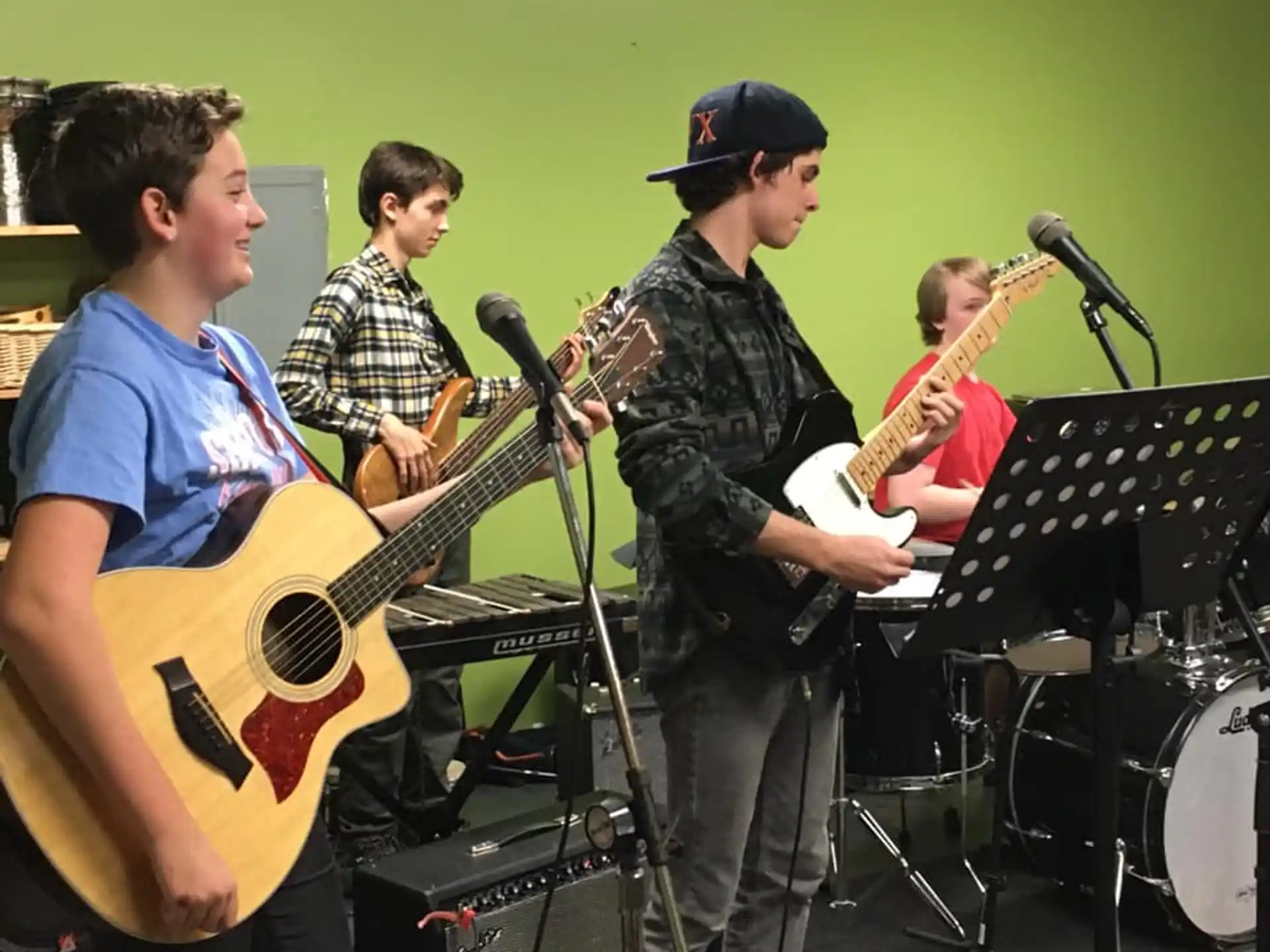 a group of people playing instruments
