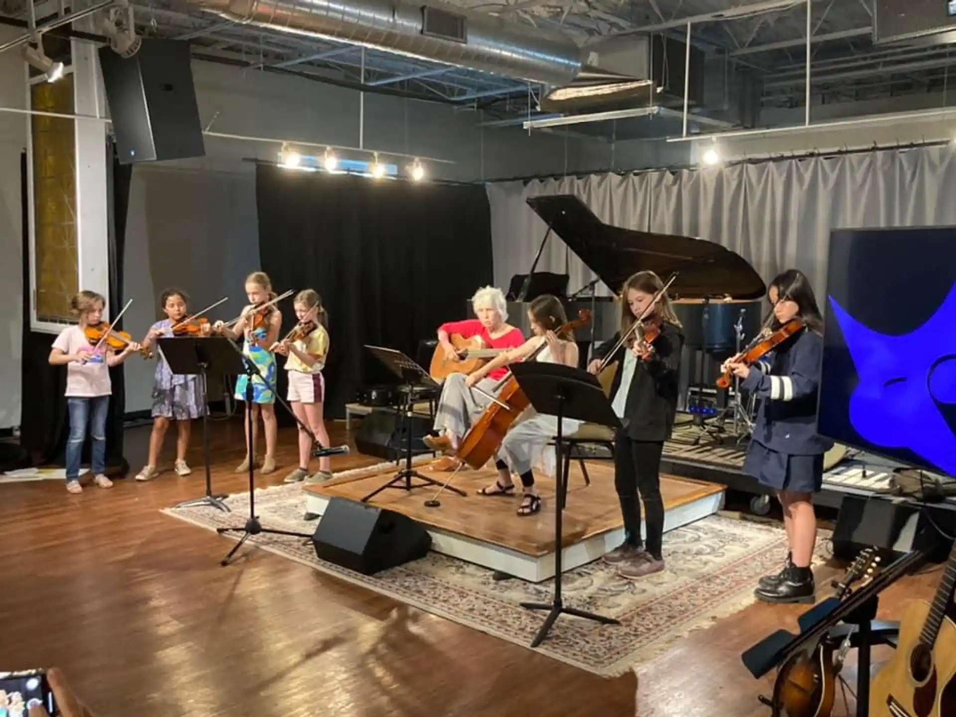 a group of people playing instruments