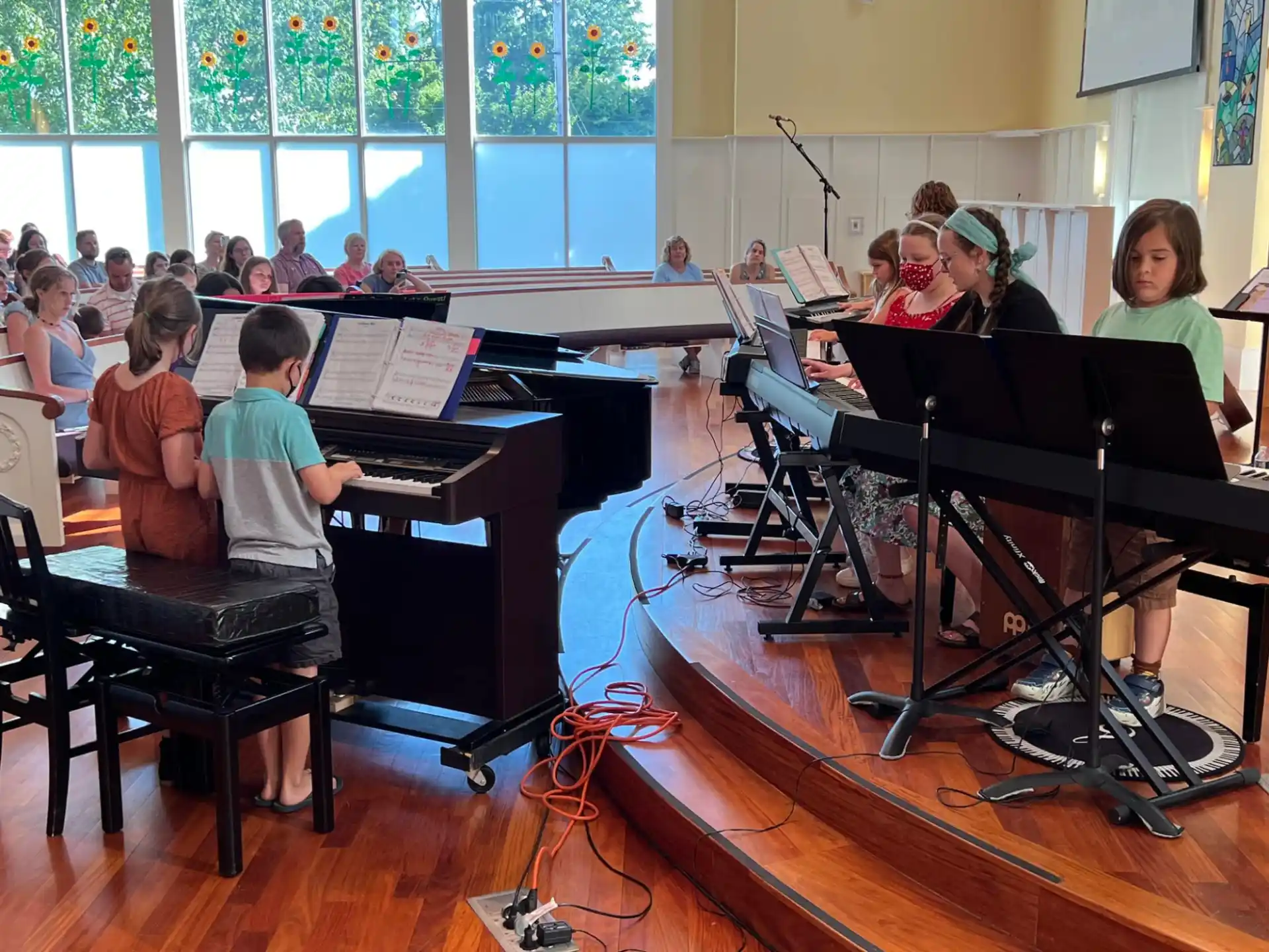 a group of kids playing musical instruments