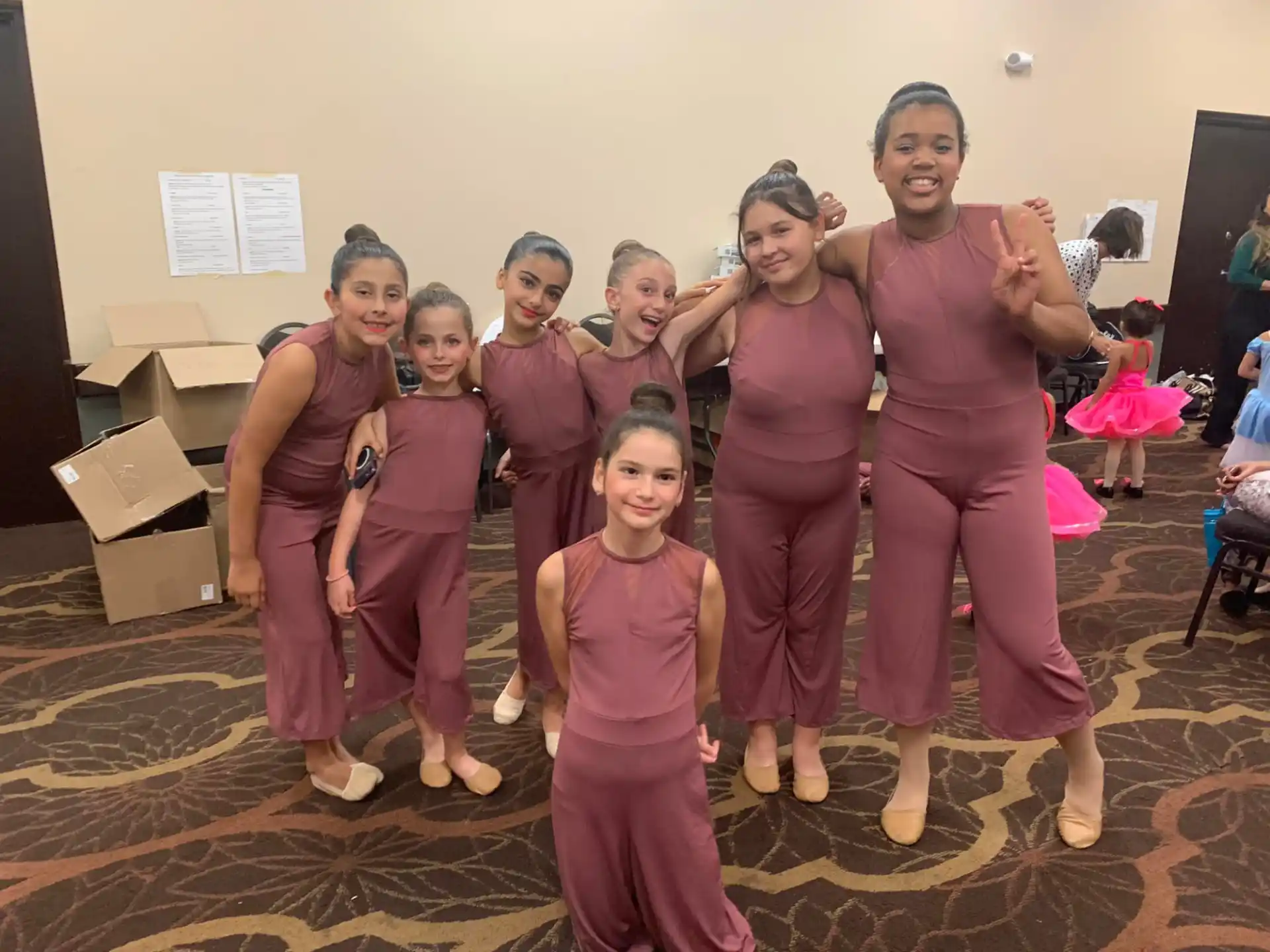 a group of women in pink