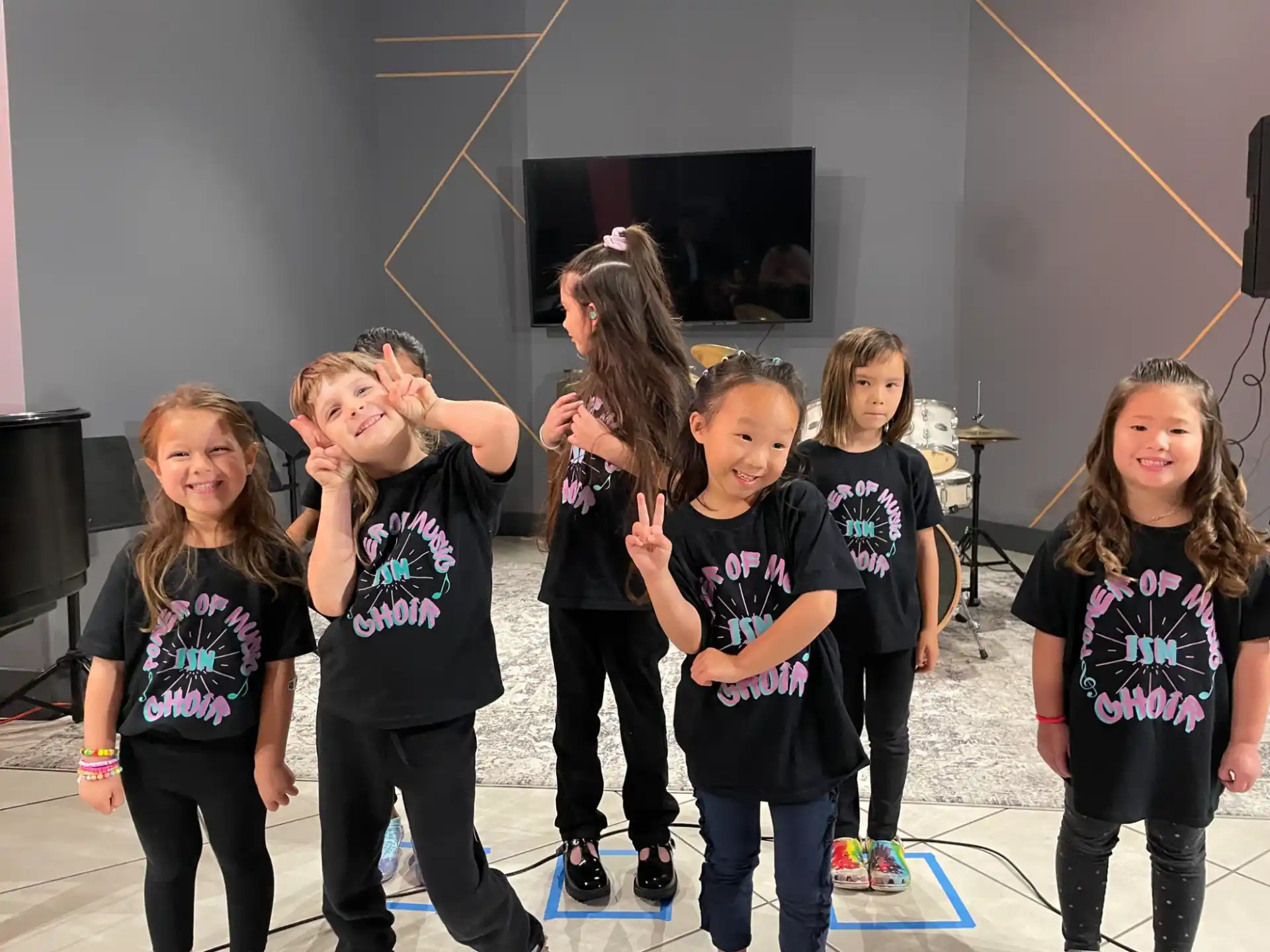 a group of children posing for a photo