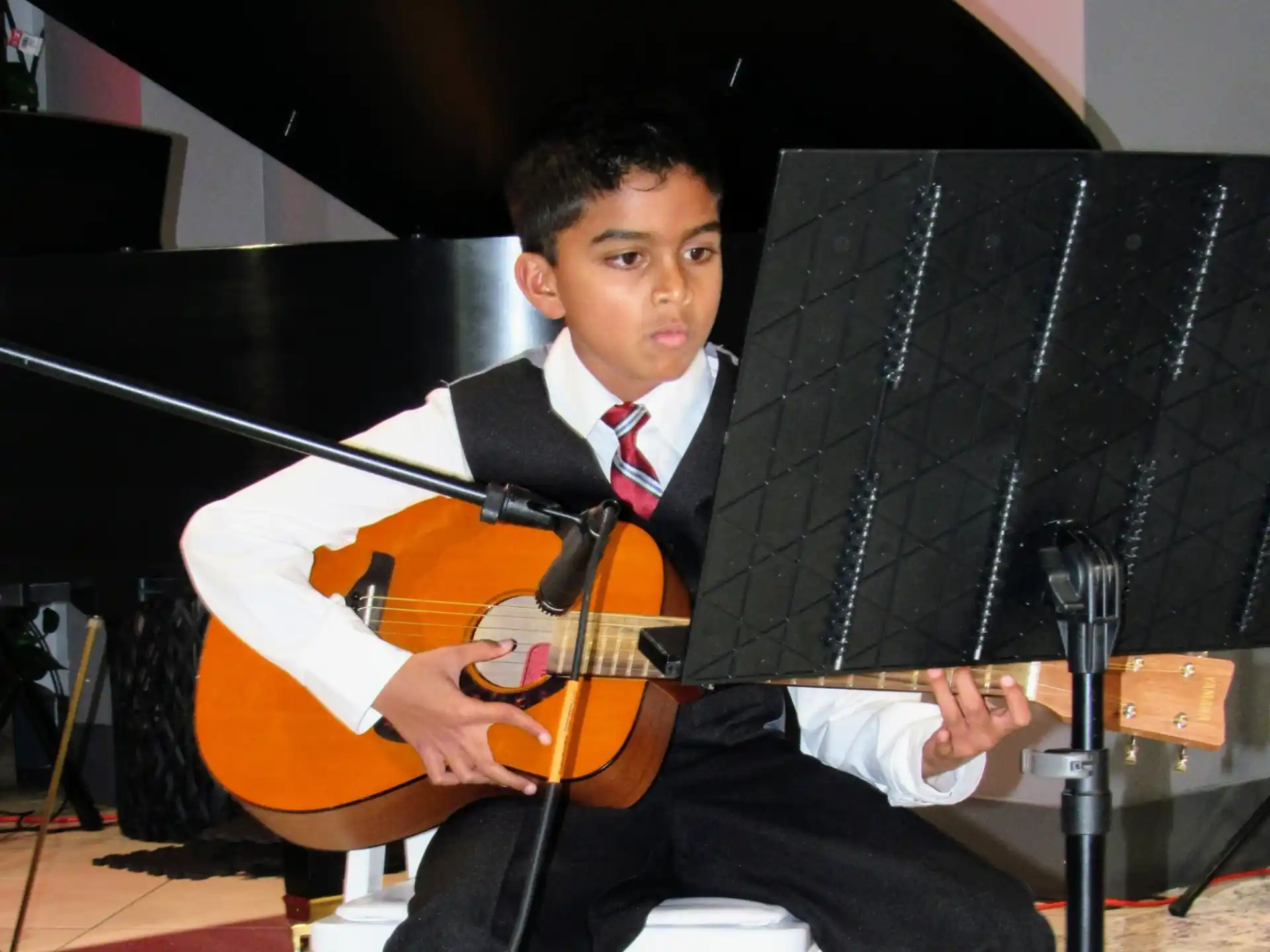 a man playing a guitar