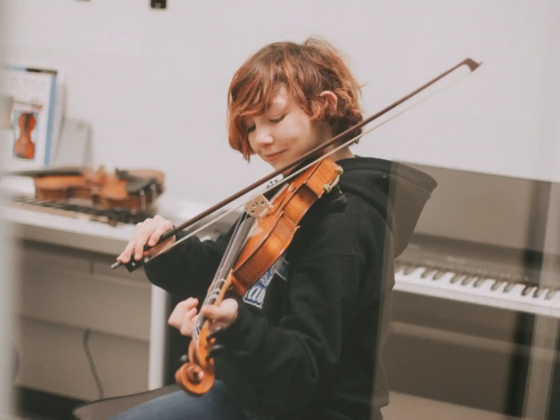 a person playing a violin