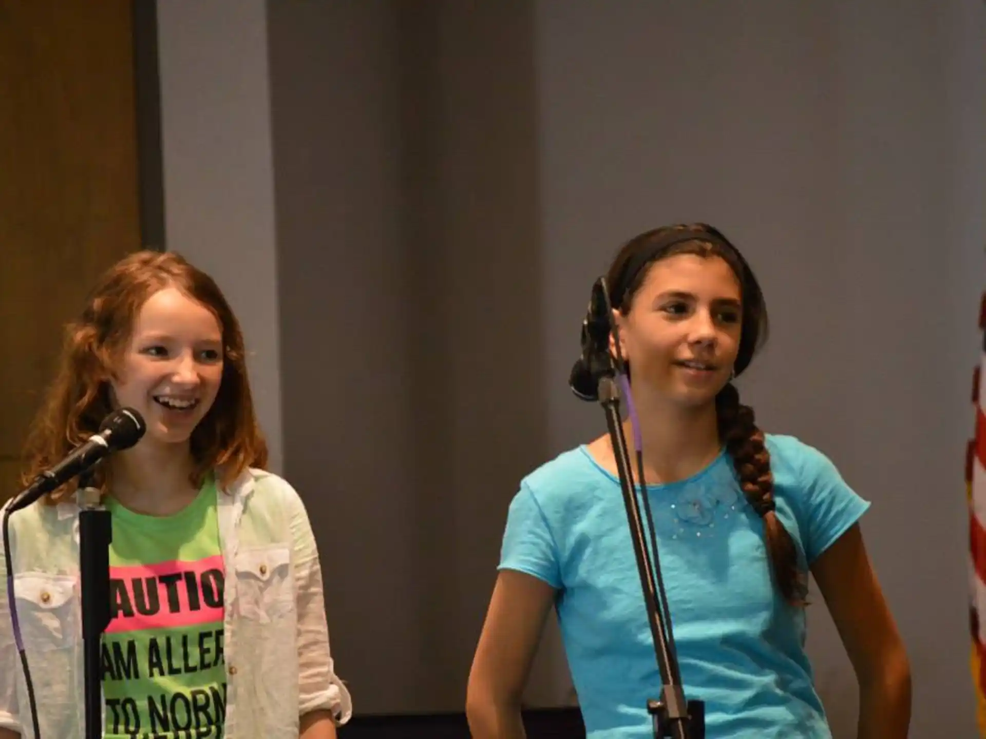 a couple of women wearing headphones