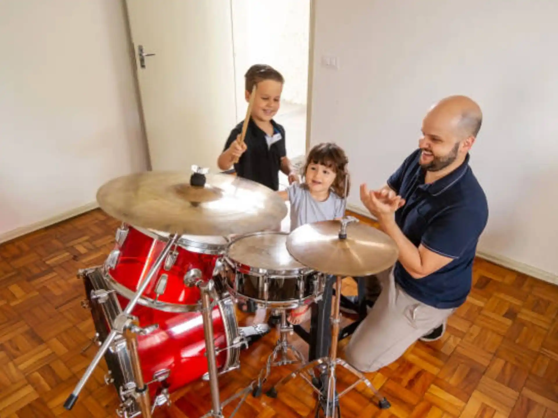 a group of people playing drums