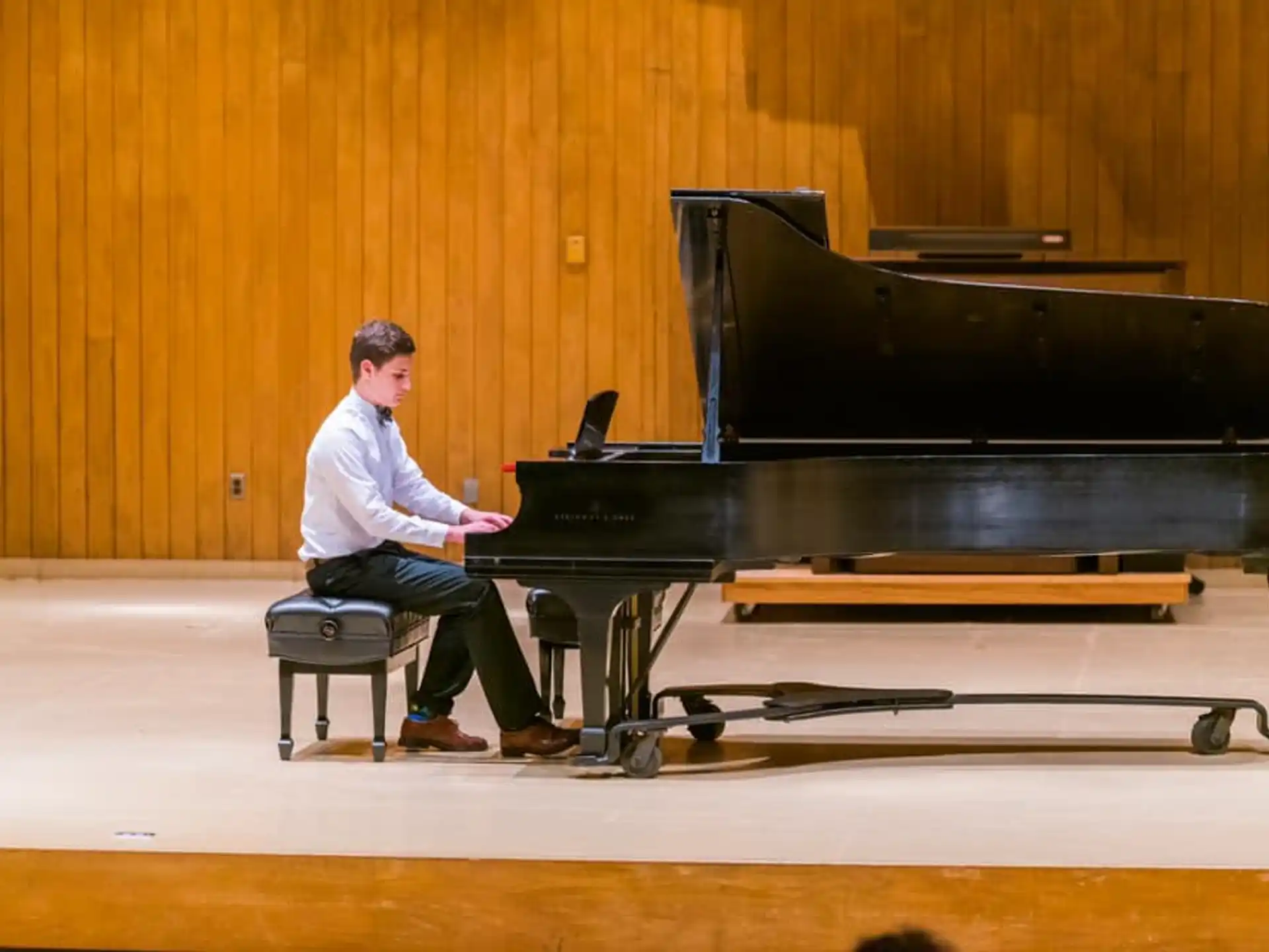 a man playing a piano