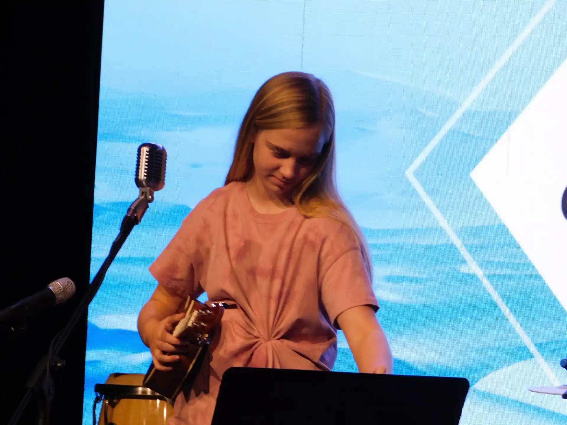 a person playing a guitar