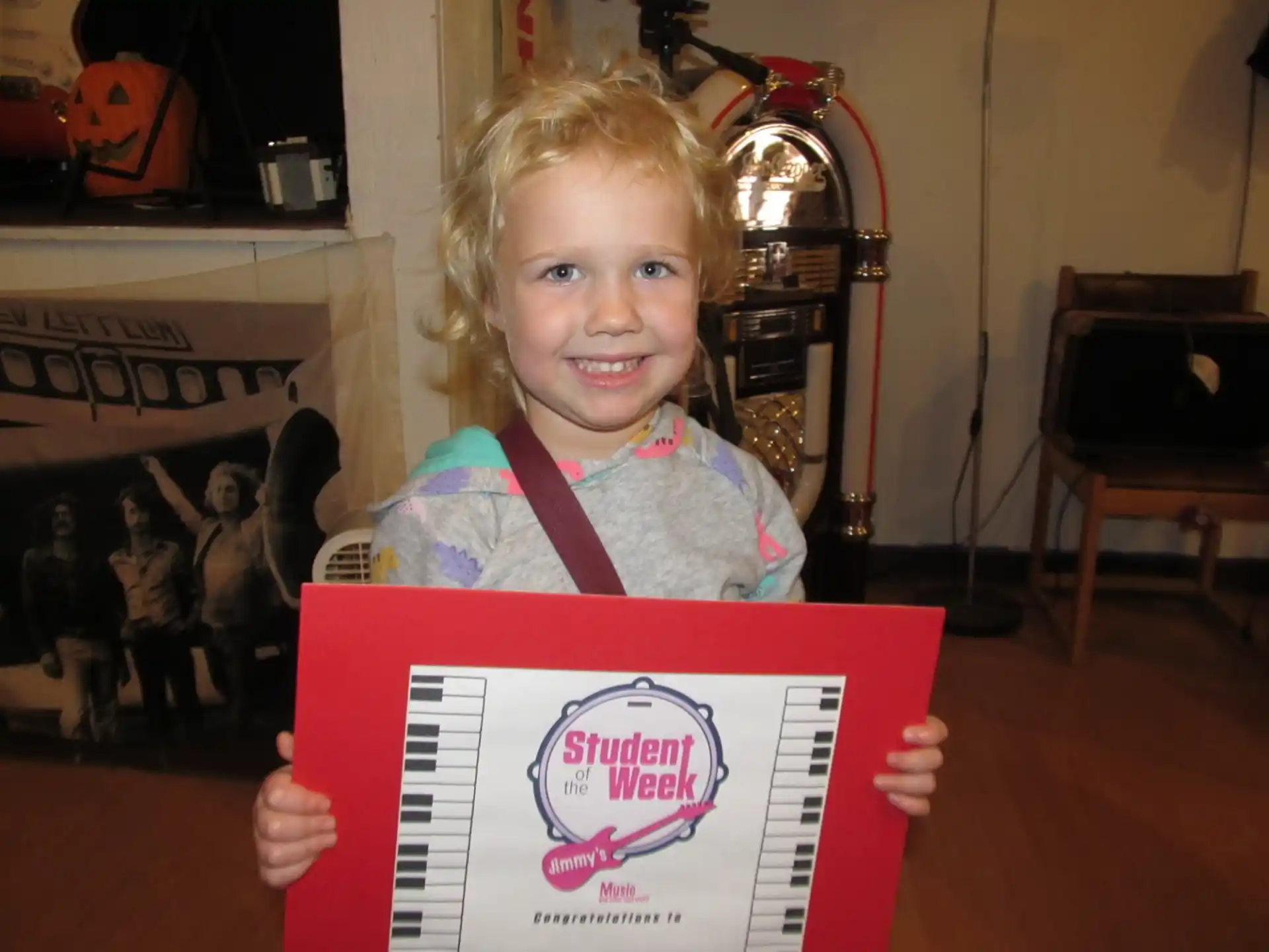a child holding a box