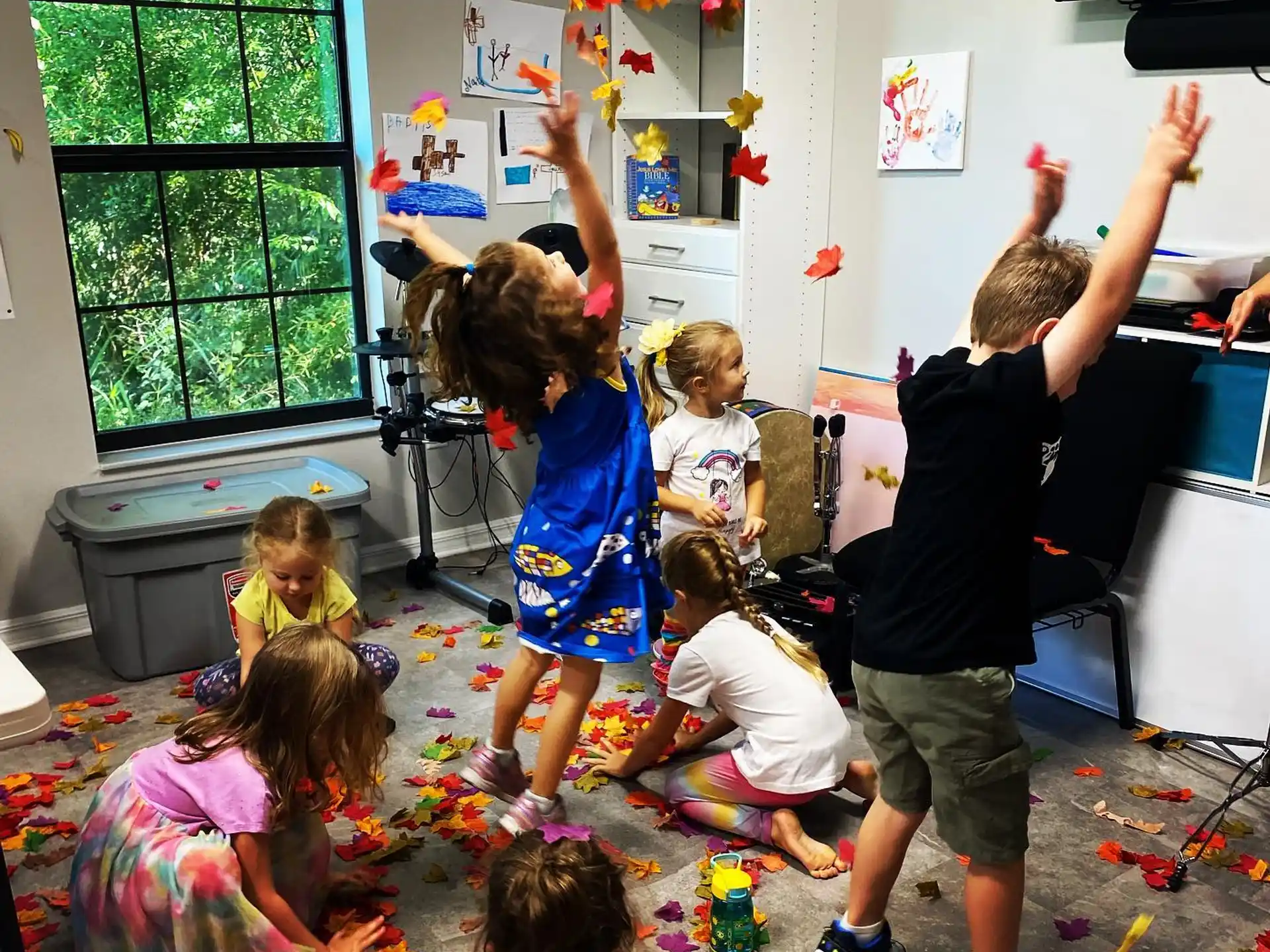 a group of children in a classroom