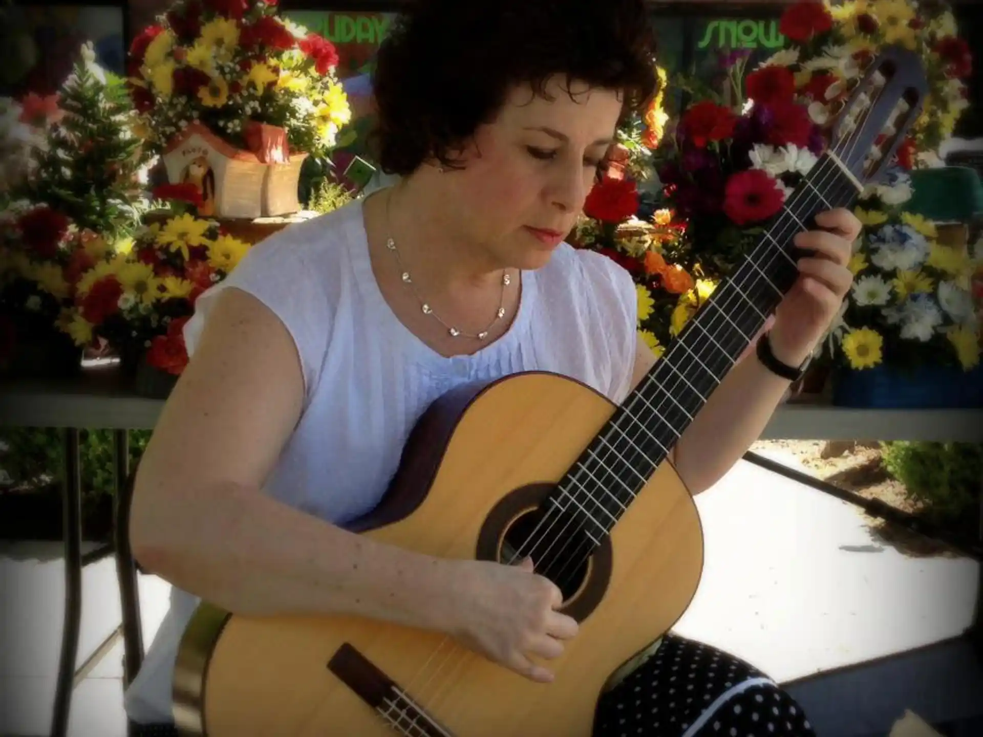 a person playing a guitar