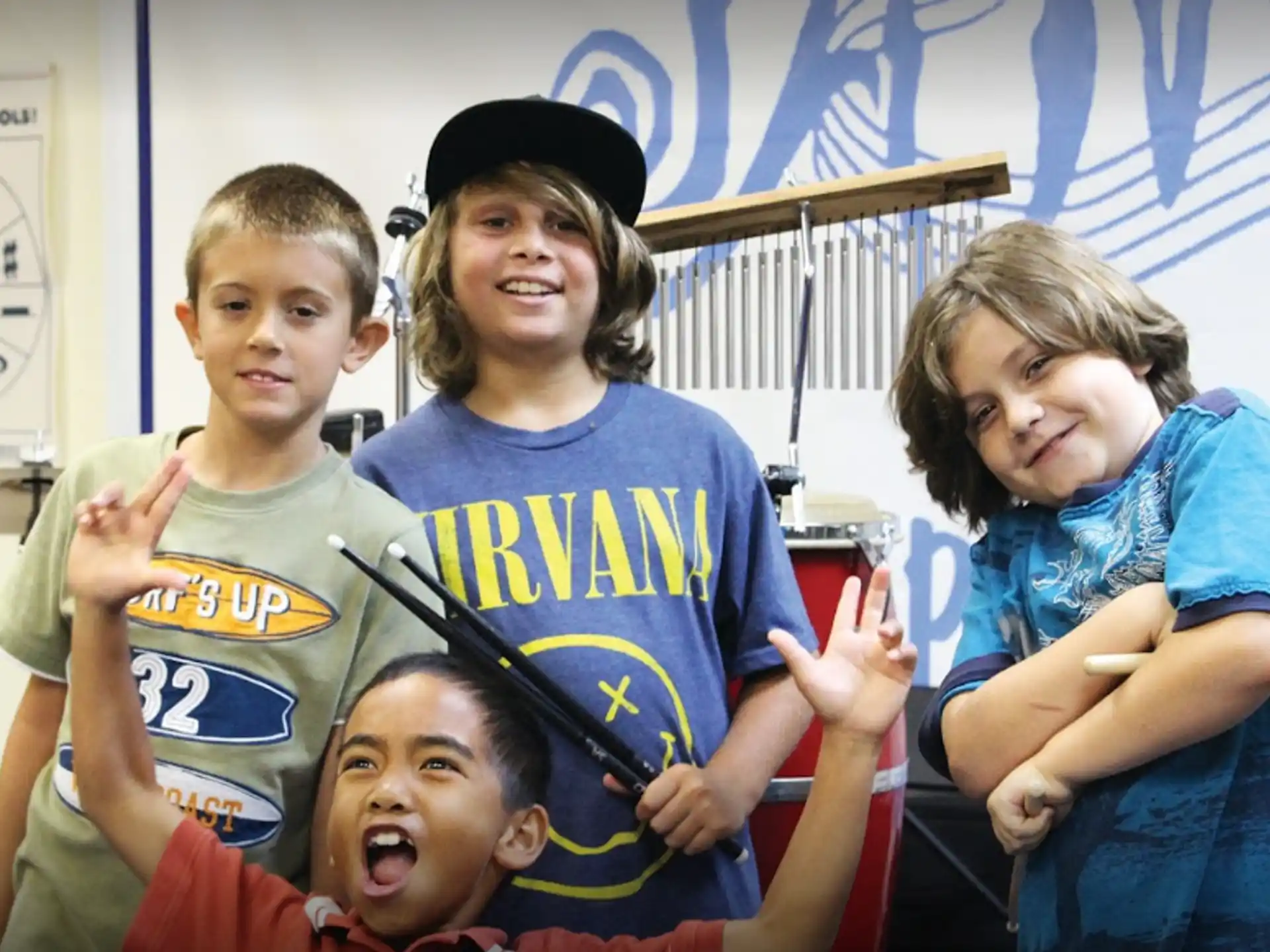 a group of kids posing for a photo