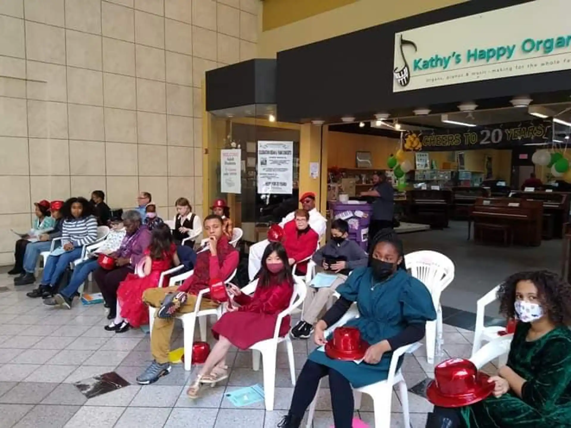 a group of people sitting in chairs