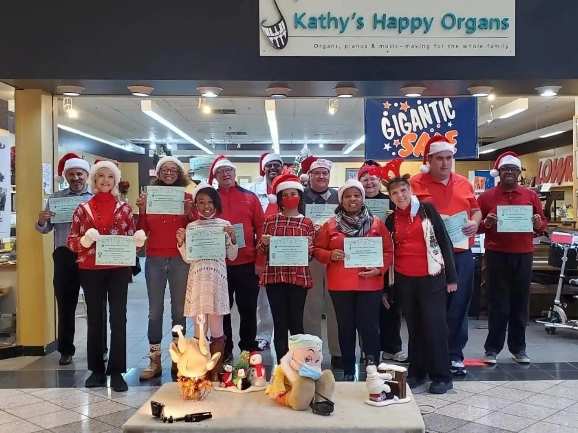 a group of people wearing red and white hats and standing in front of a store