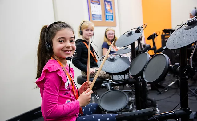 a group of people playing instruments