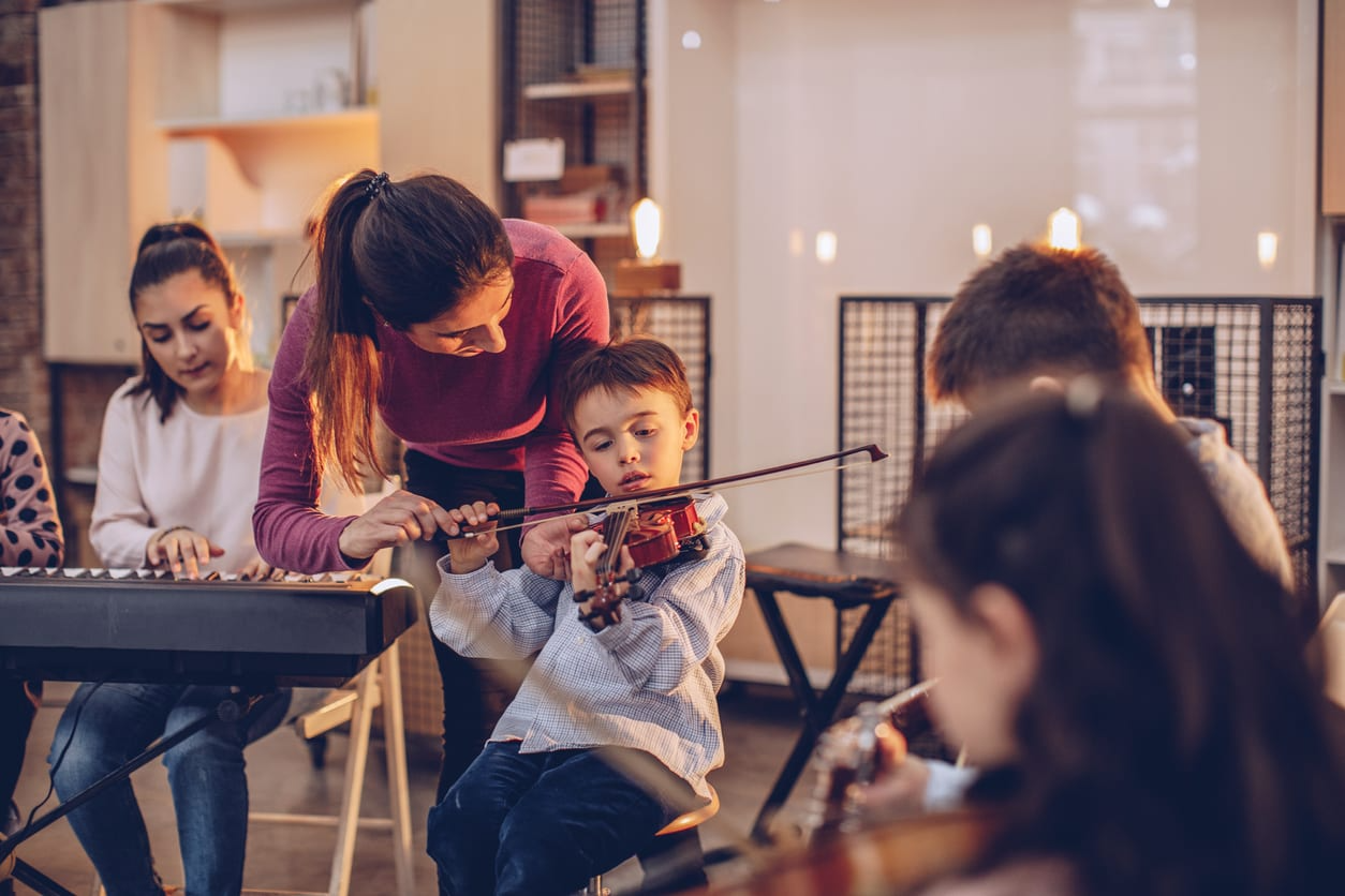 a group of people playing instruments
