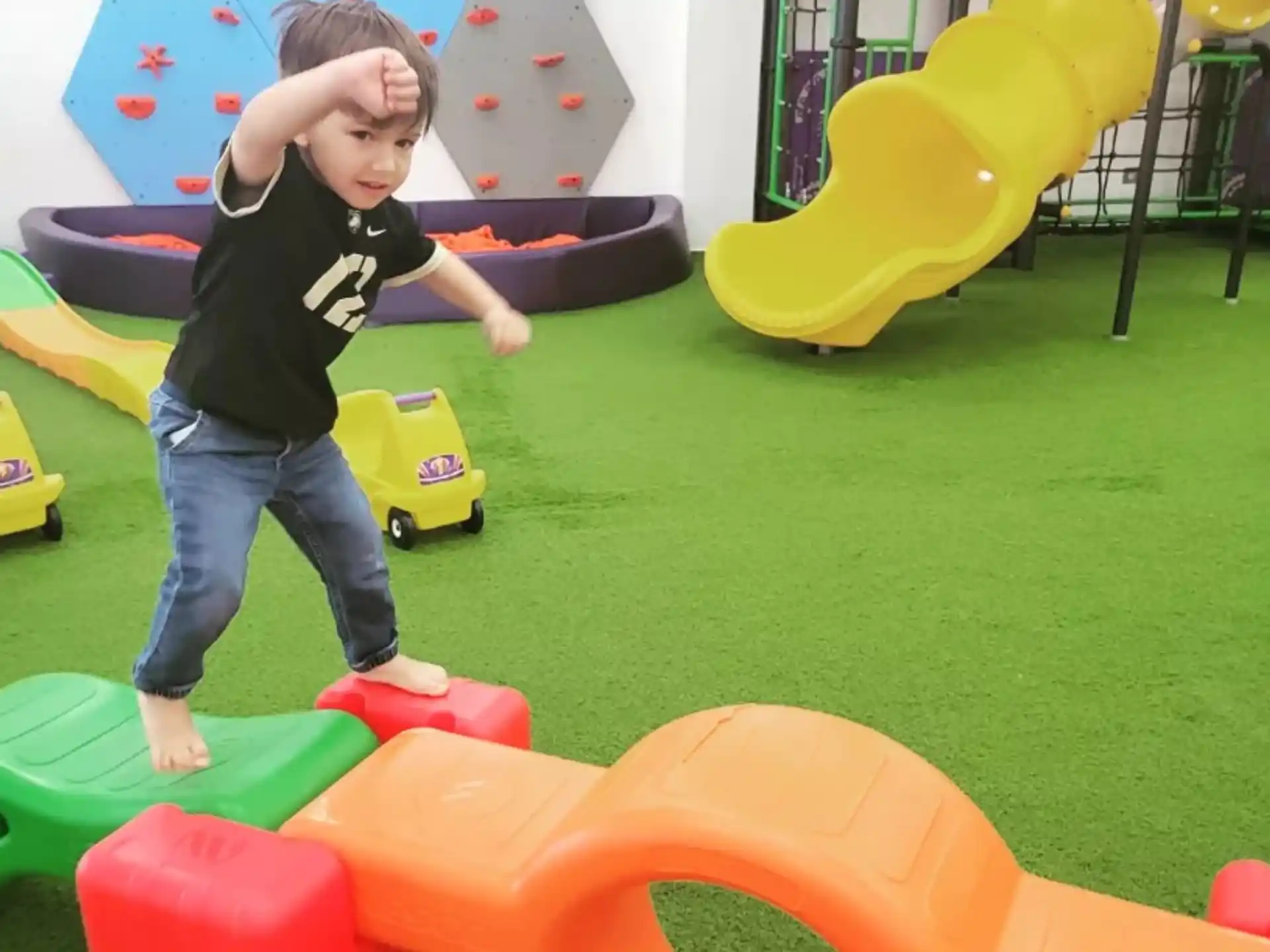 a child playing on a playground