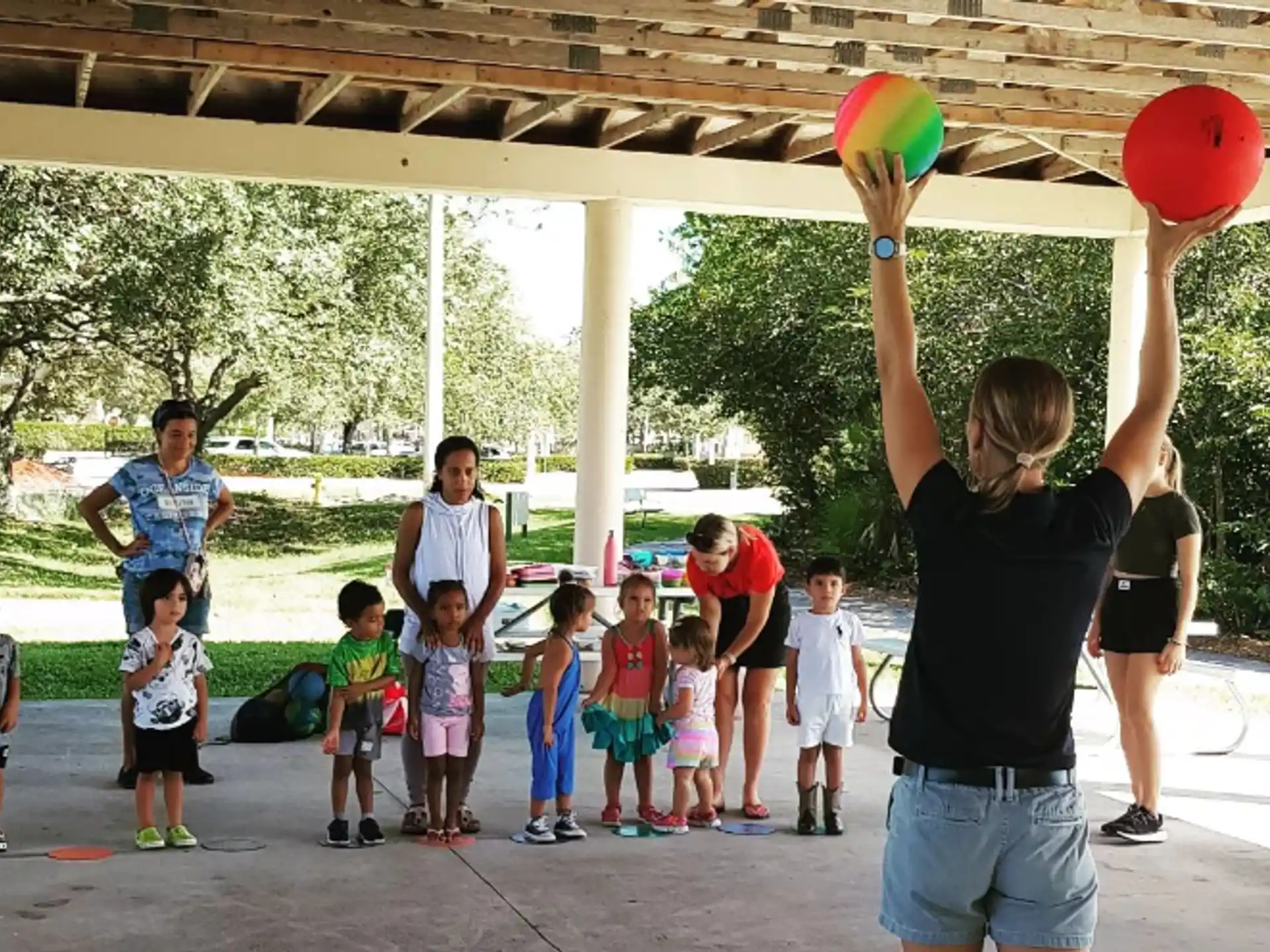 a group of people playing with a ball