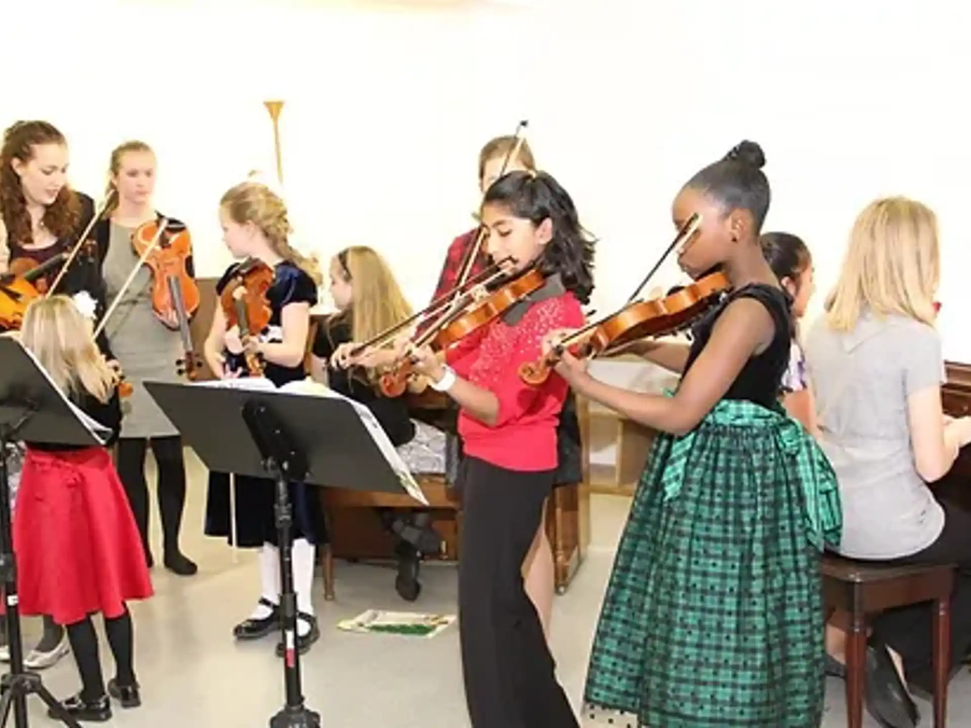 a group of people playing instruments