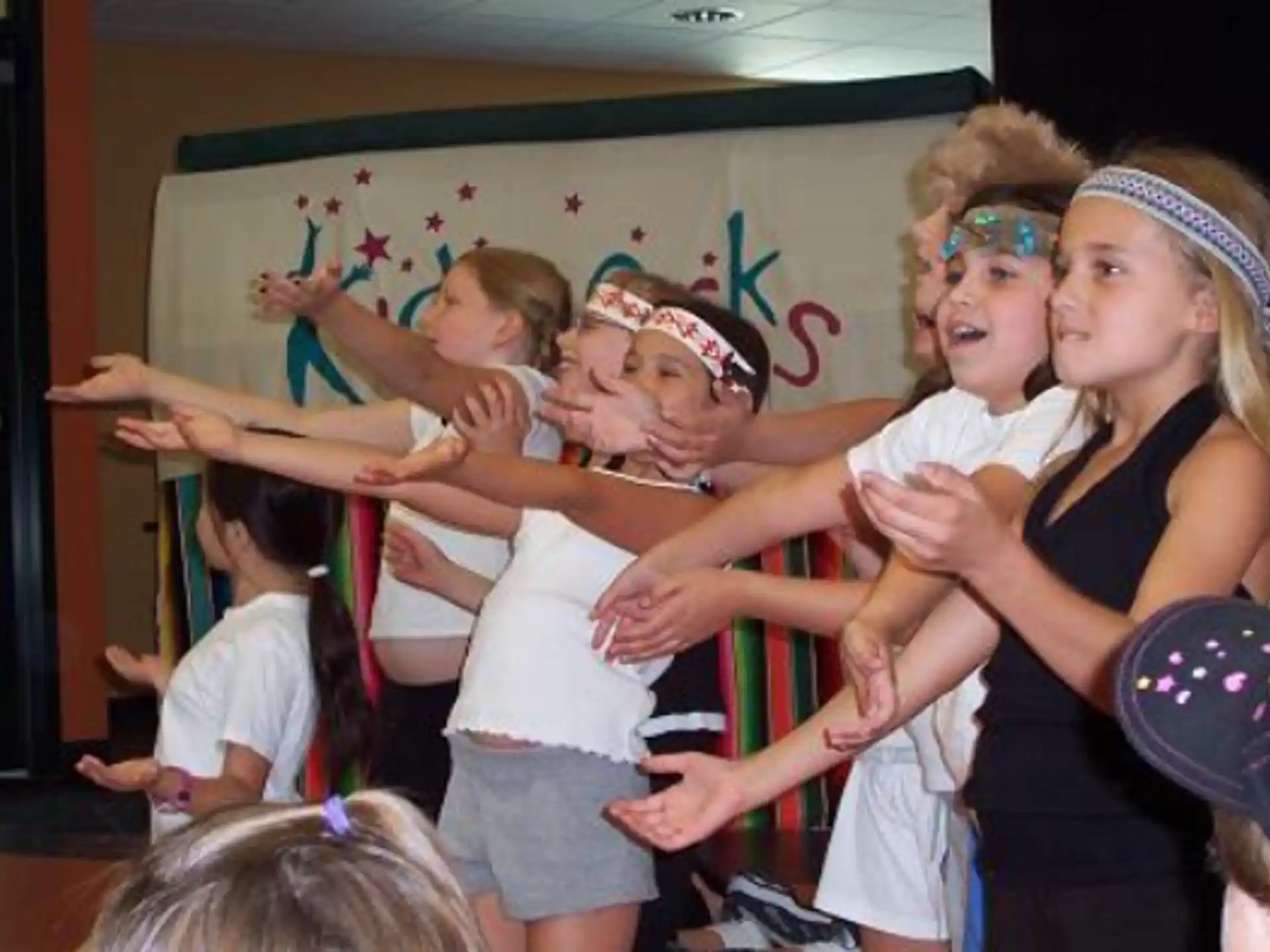 a group of children dancing