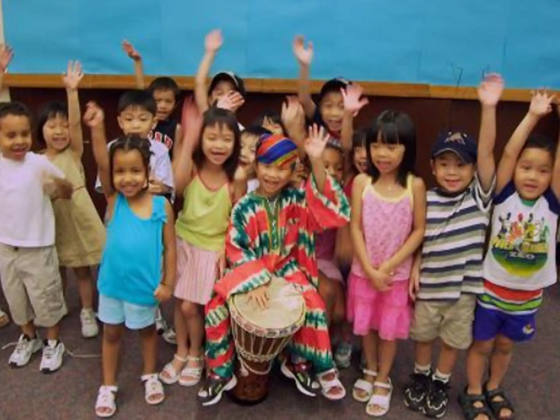 a group of children posing for a photo