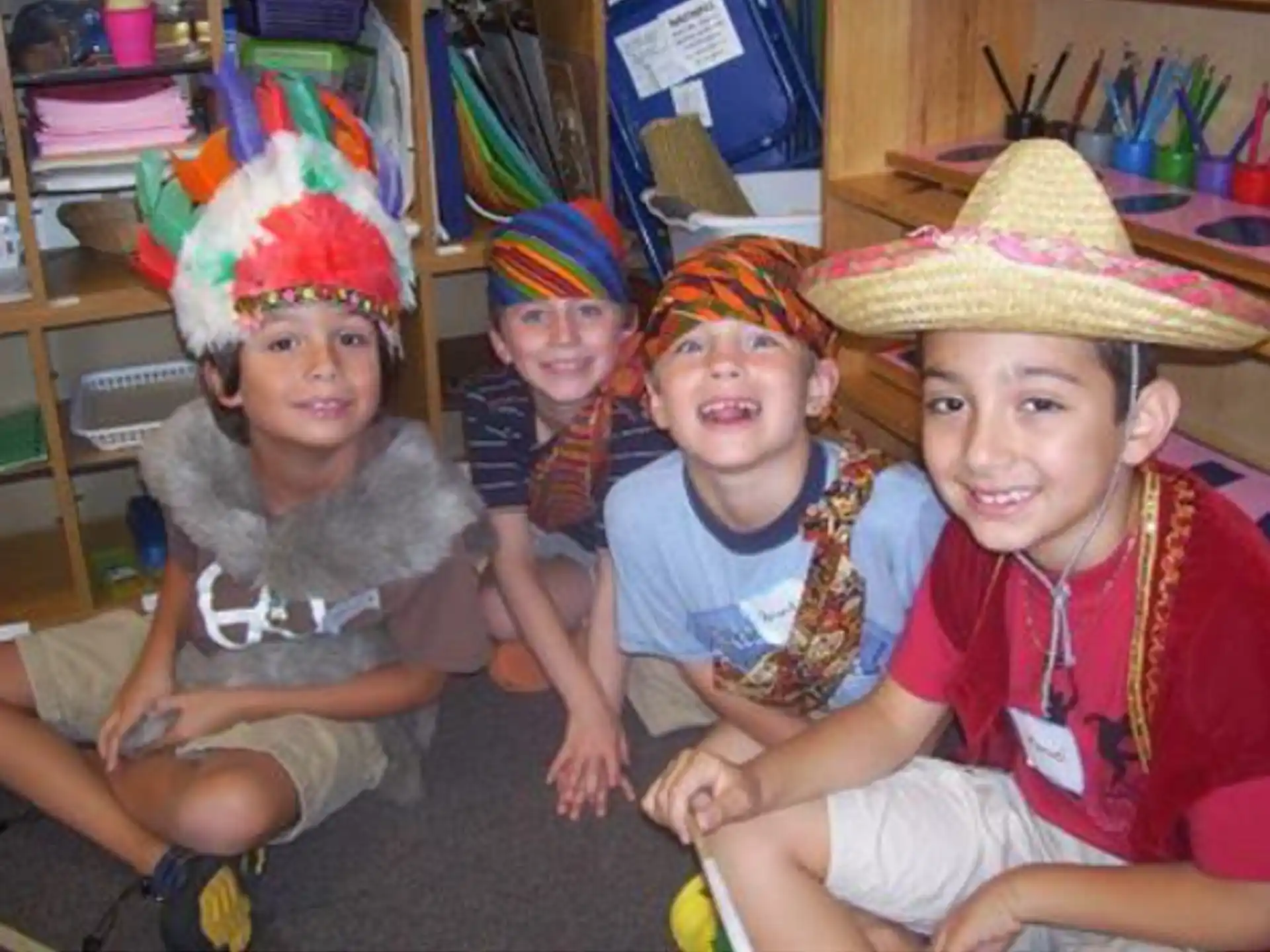a group of children wearing hats