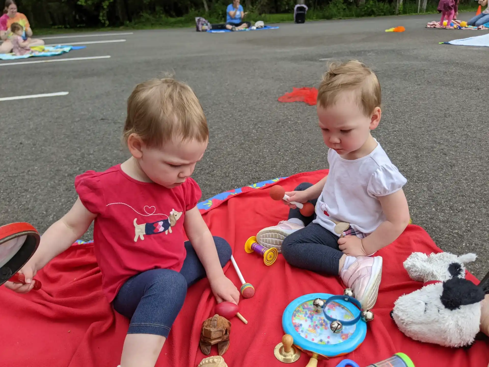 kids sitting on the ground