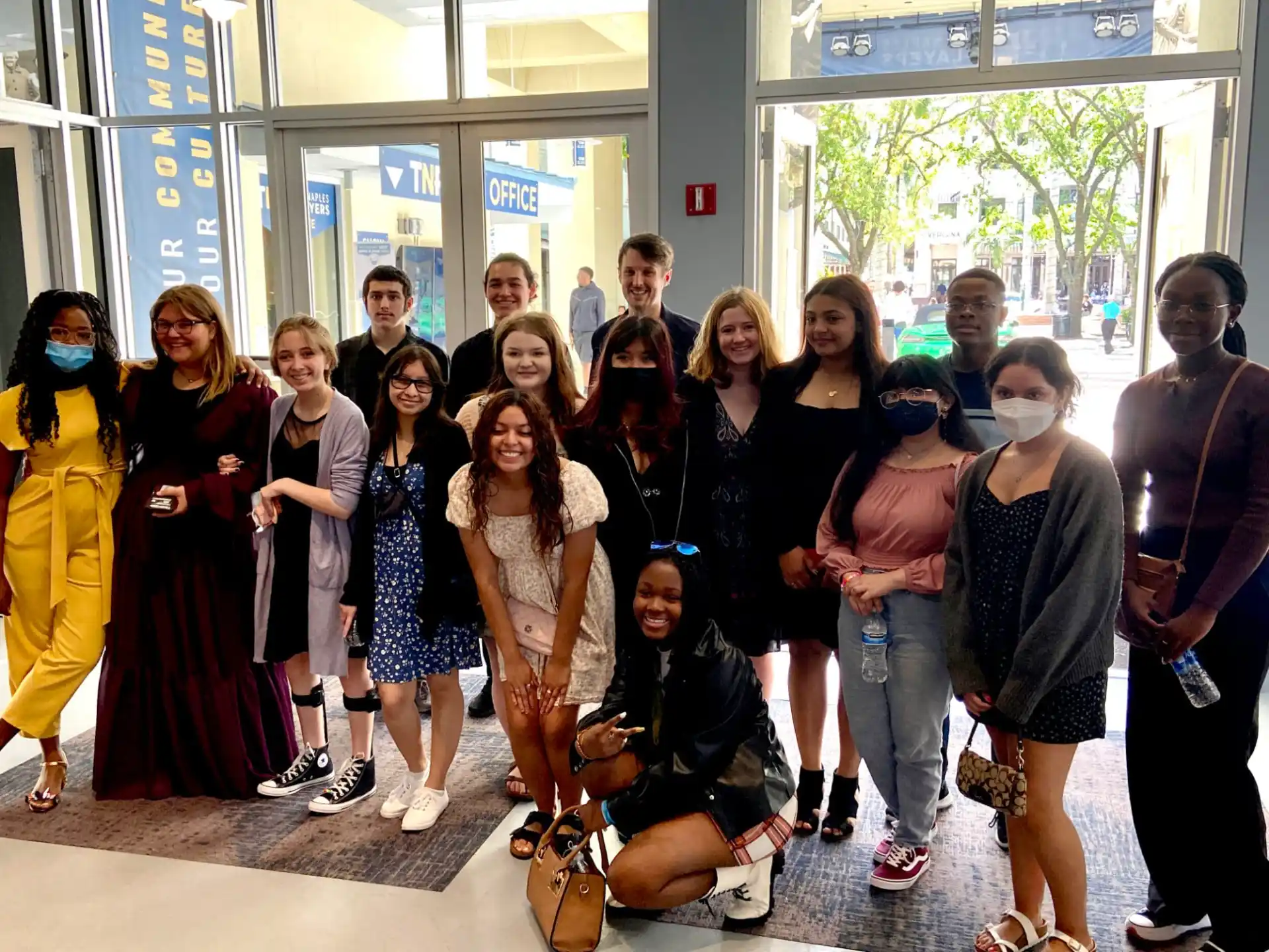 a group of people posing for a photo