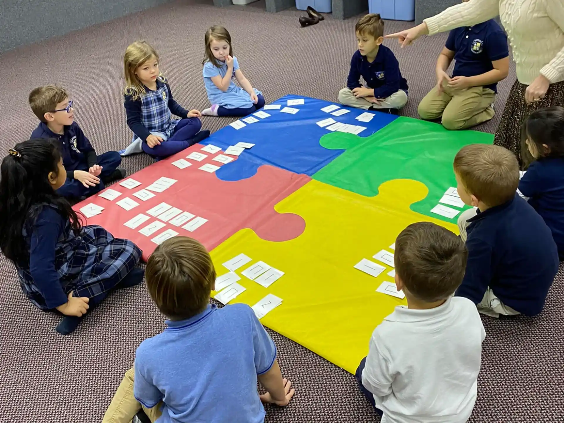 a group of children sitting on the floor