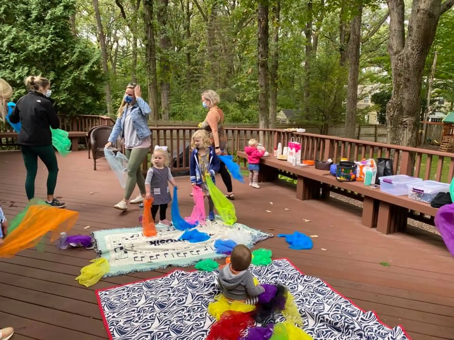 a group of people on a picnic table