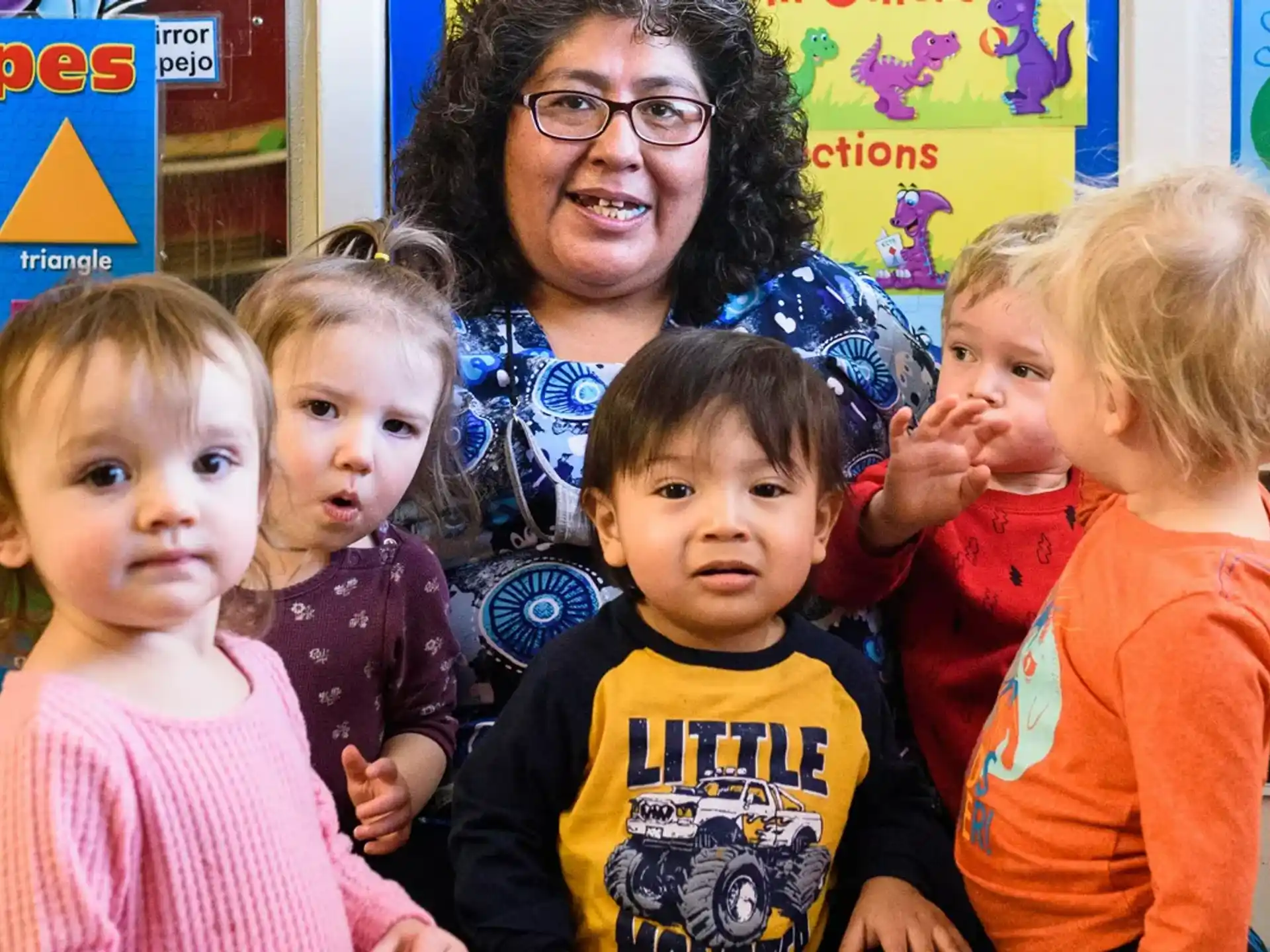 a group of children posing for a photo