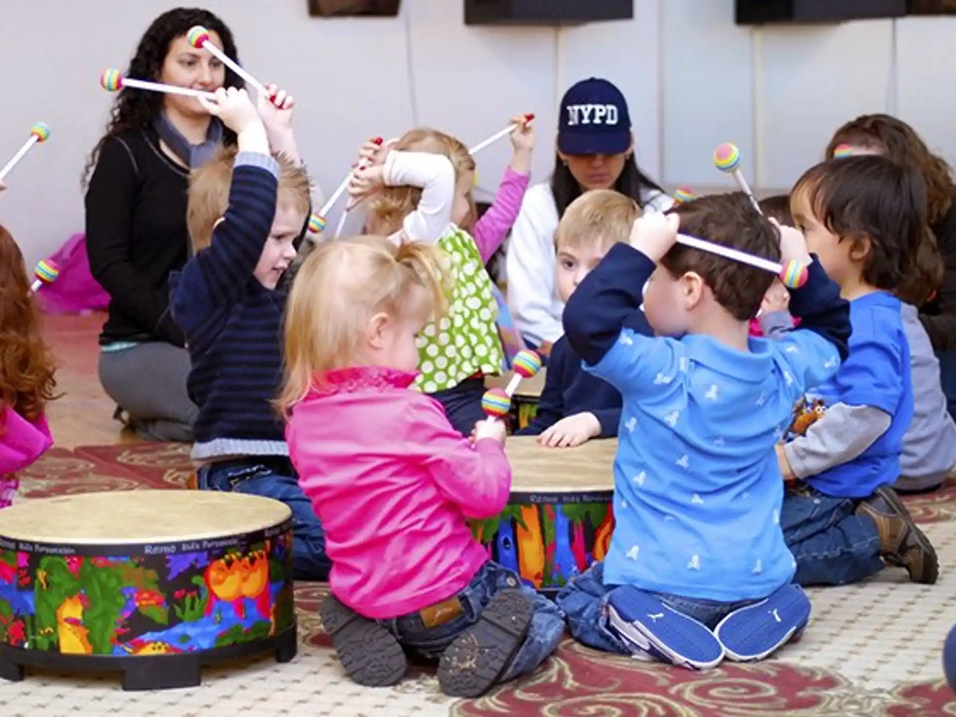 a group of children playing with toys