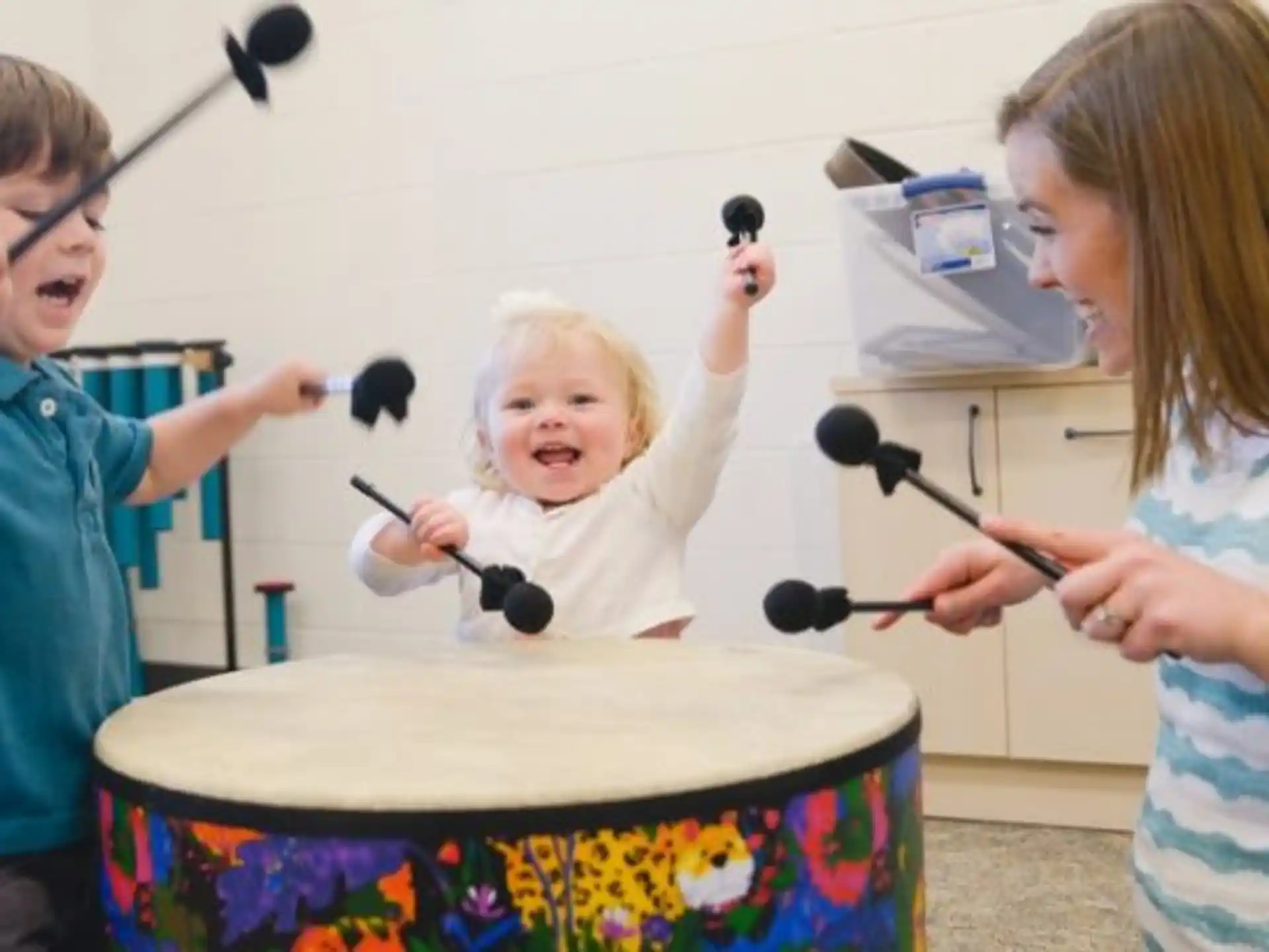 a group of kids playing with a toy