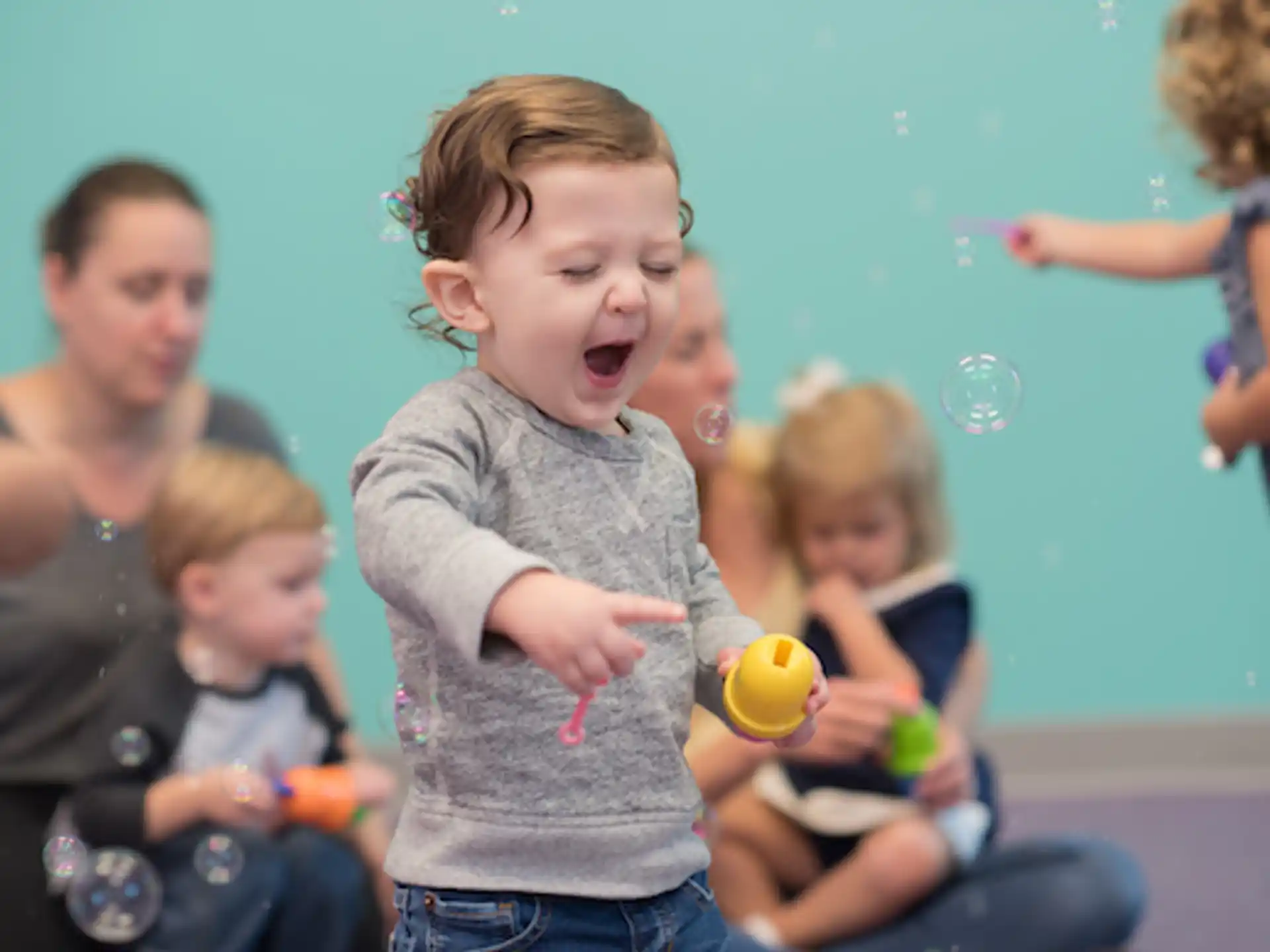 a group of children playing with balls