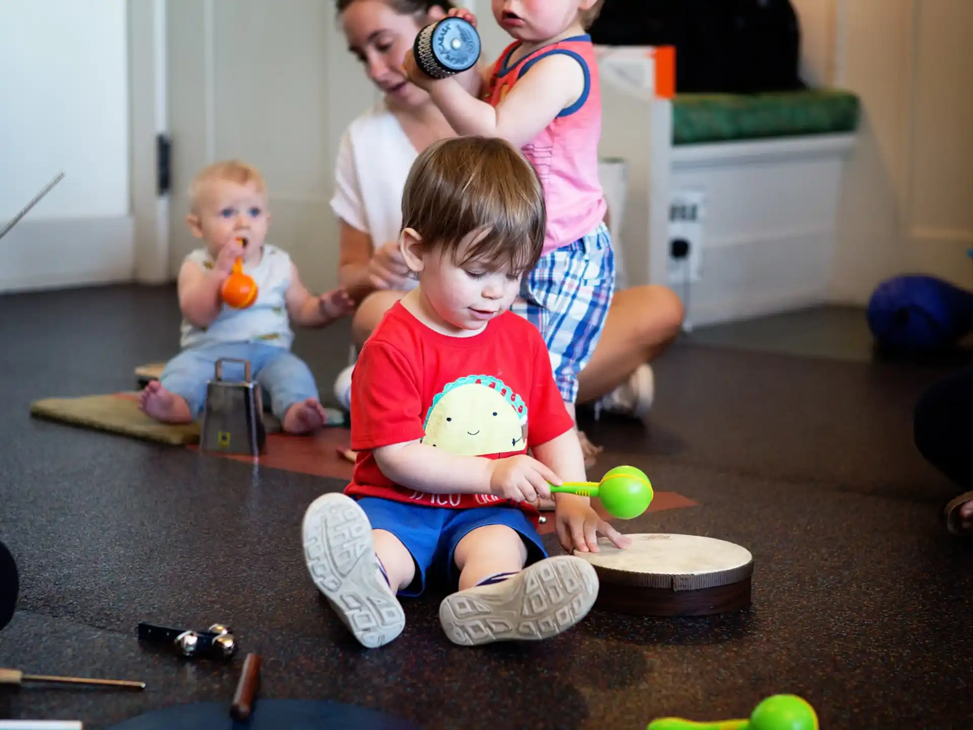 a group of kids playing with toys