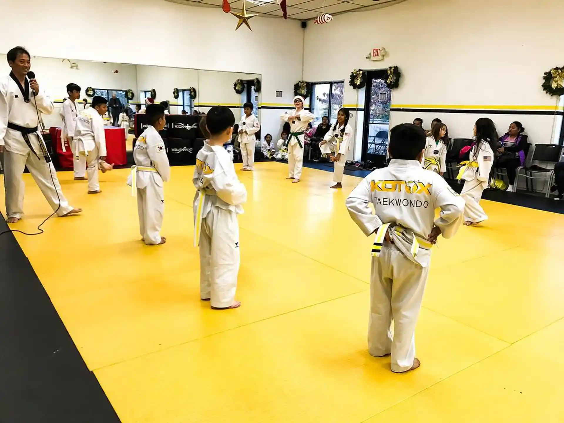 a group of people in karate uniforms
