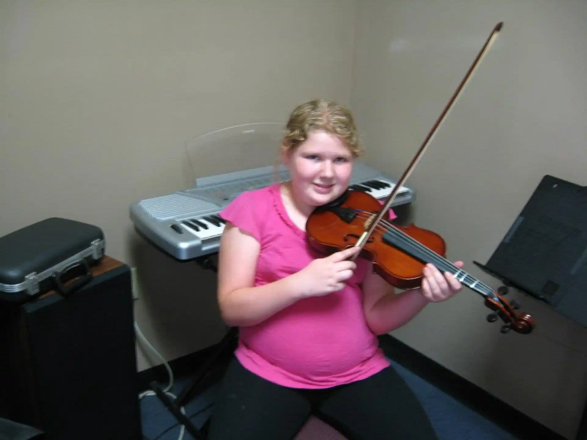 a person playing a violin