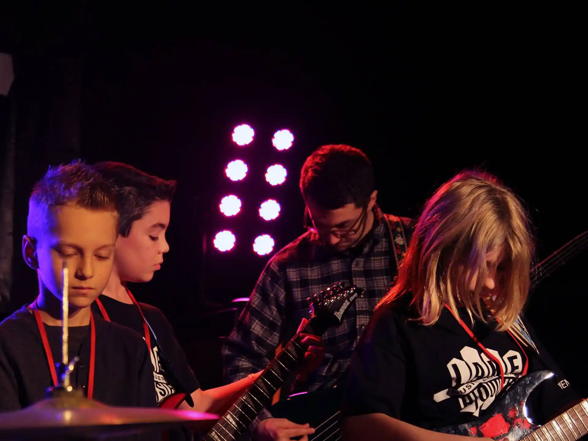 a group of people playing instruments