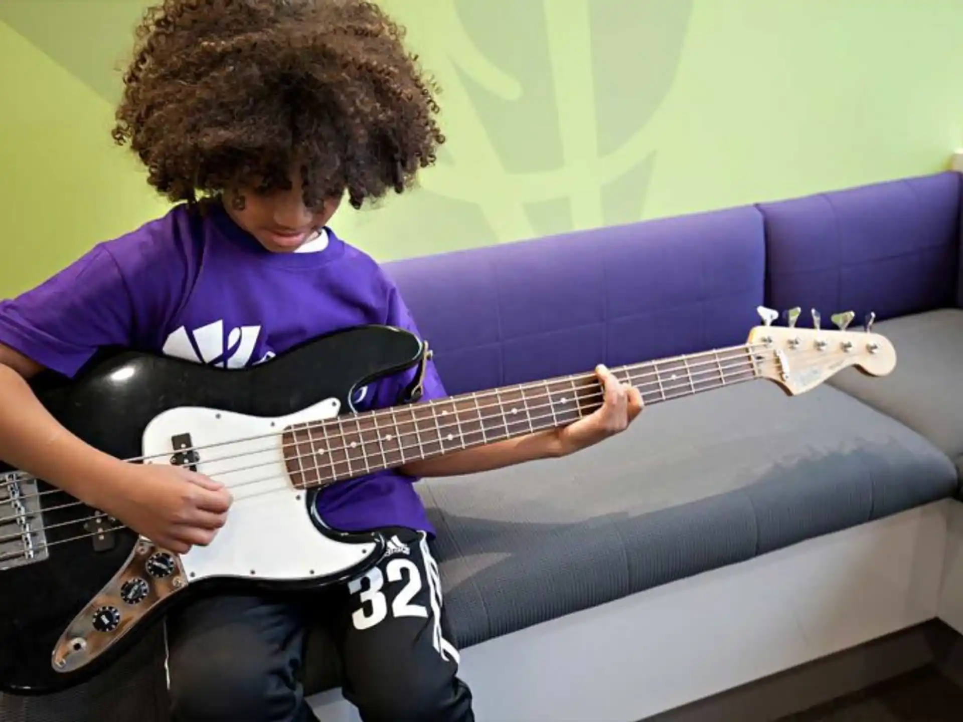a person playing a guitar